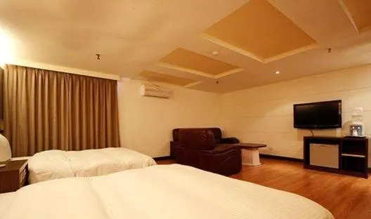 Bed in Zaw Jung Business Hotel