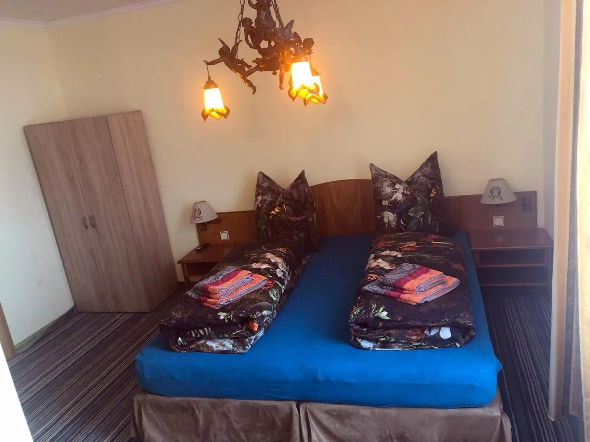 Bed in Hotel Eulenspiegel - Das Erlebnishotel in Riesa