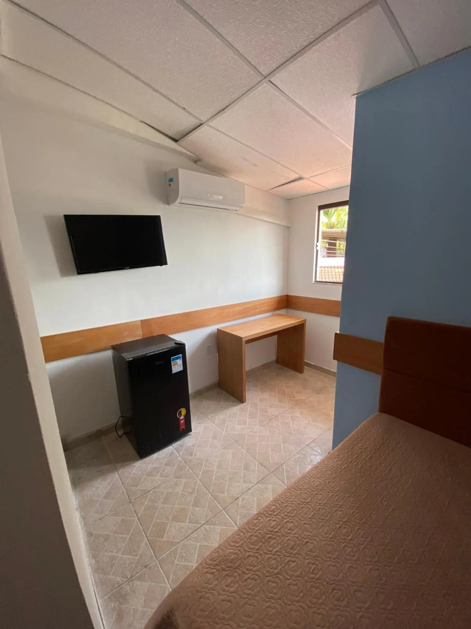 Bed in Pousada Queiroz