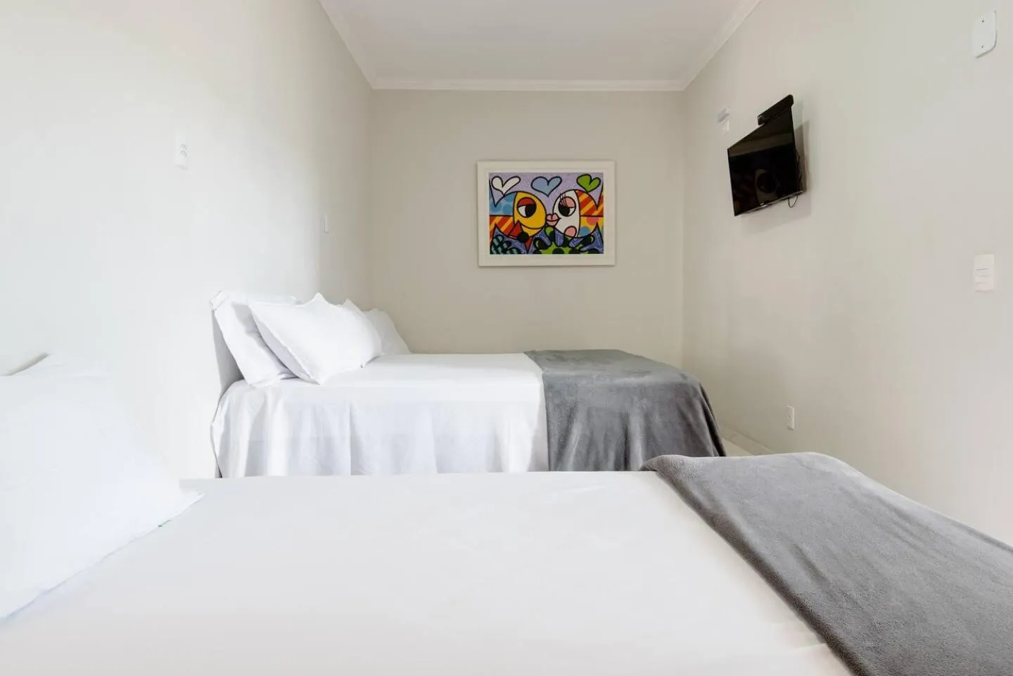 Bed in Pousada Queiroz