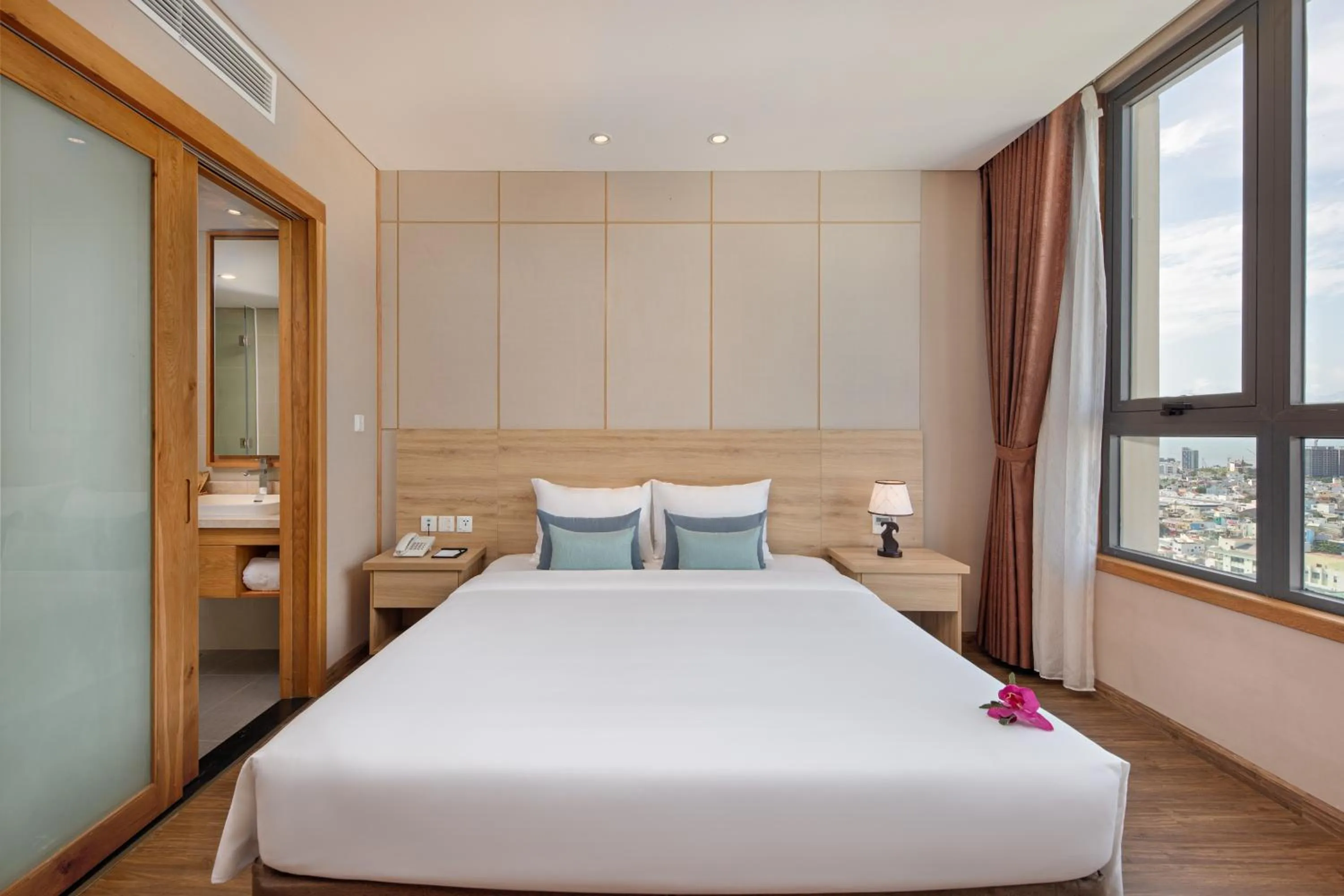 Bed in G8 Luxury Hotel and Spa Da Nang