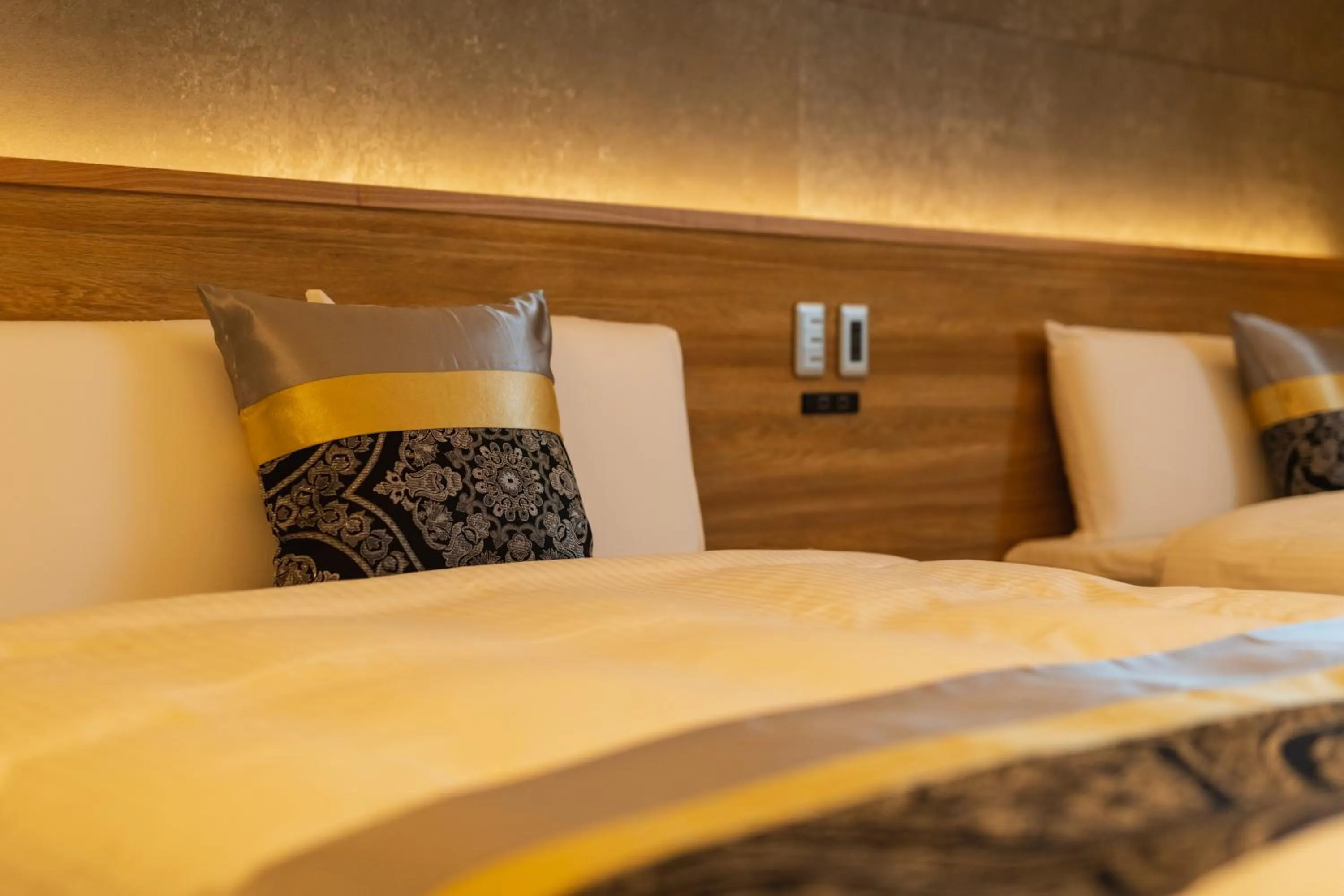 Bed in GRAND BASE Beppu