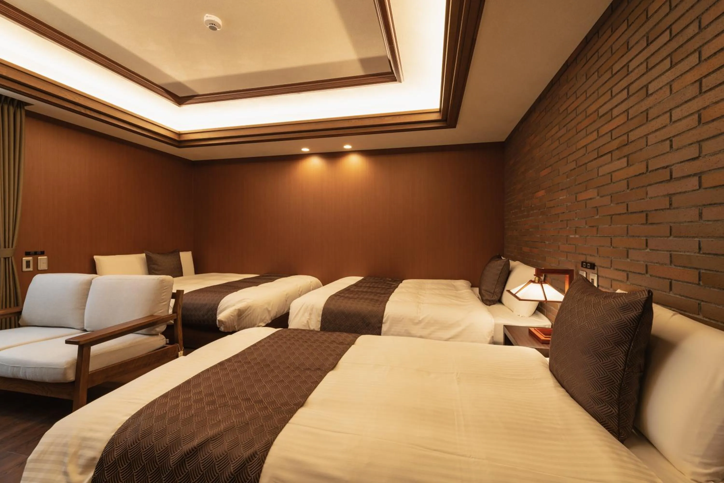 Bed in GRAND BASE Beppu