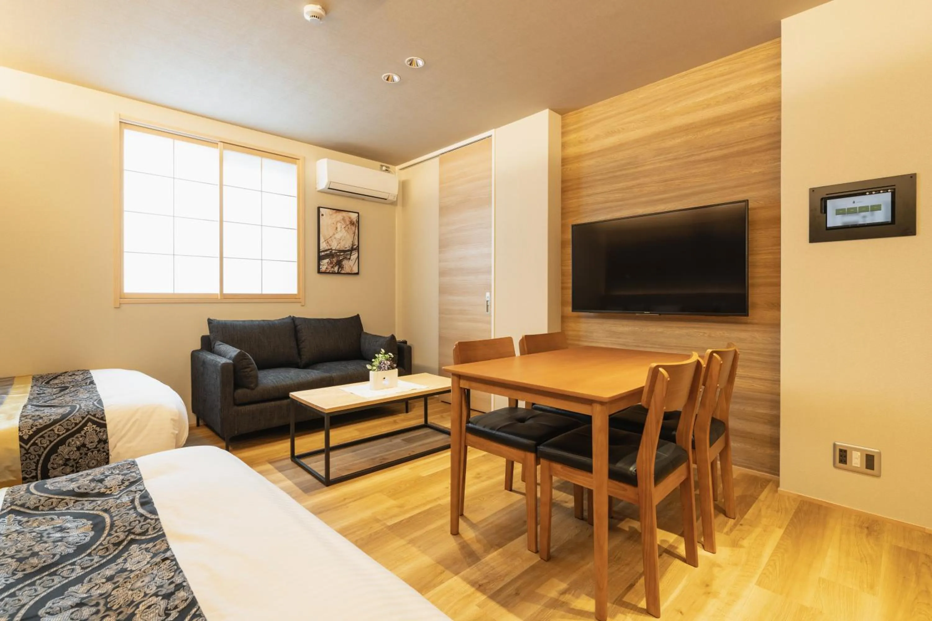 Living room, Bed in GRAND BASE Beppu