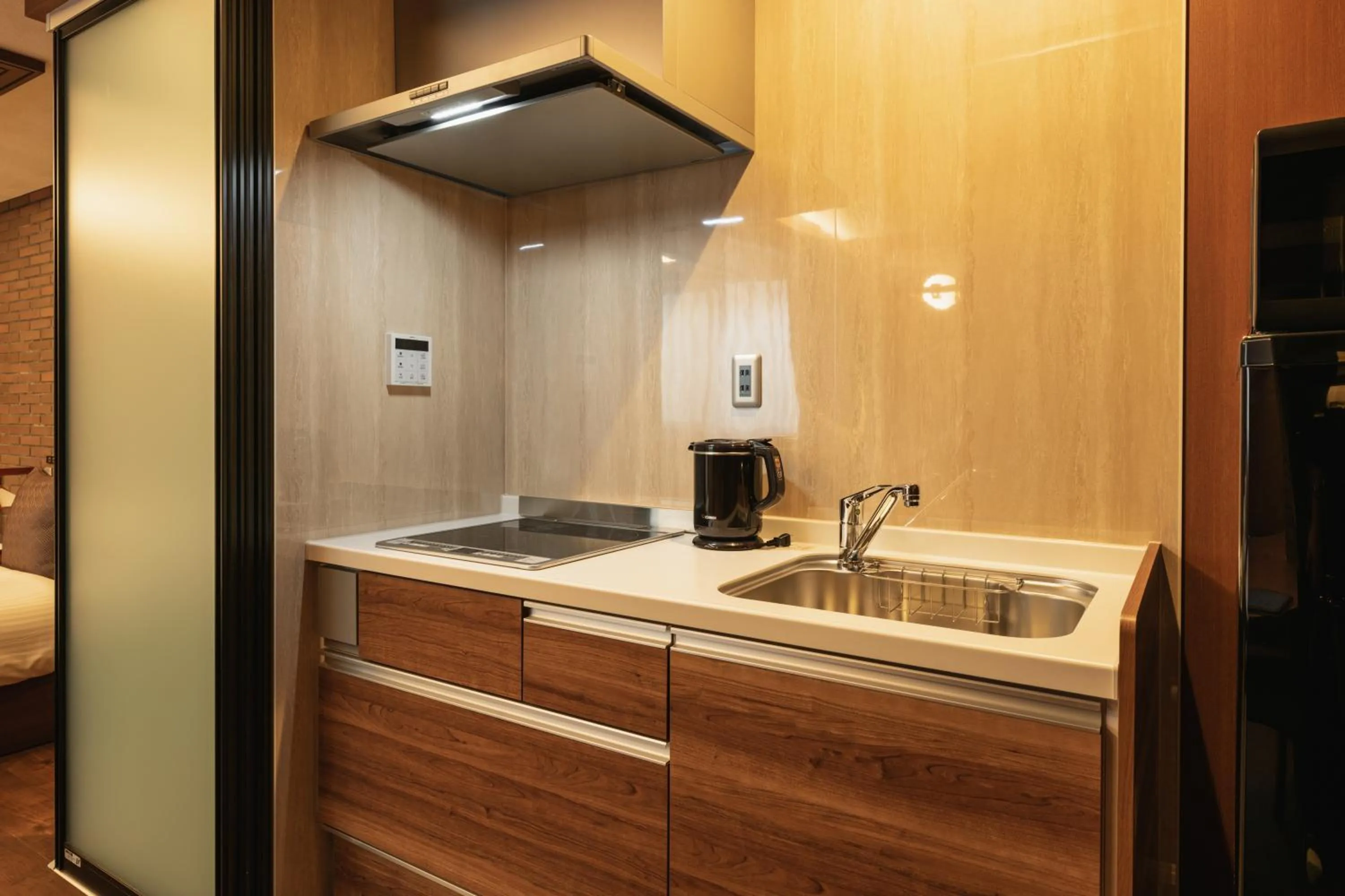 Kitchen or kitchenette in GRAND BASE Beppu