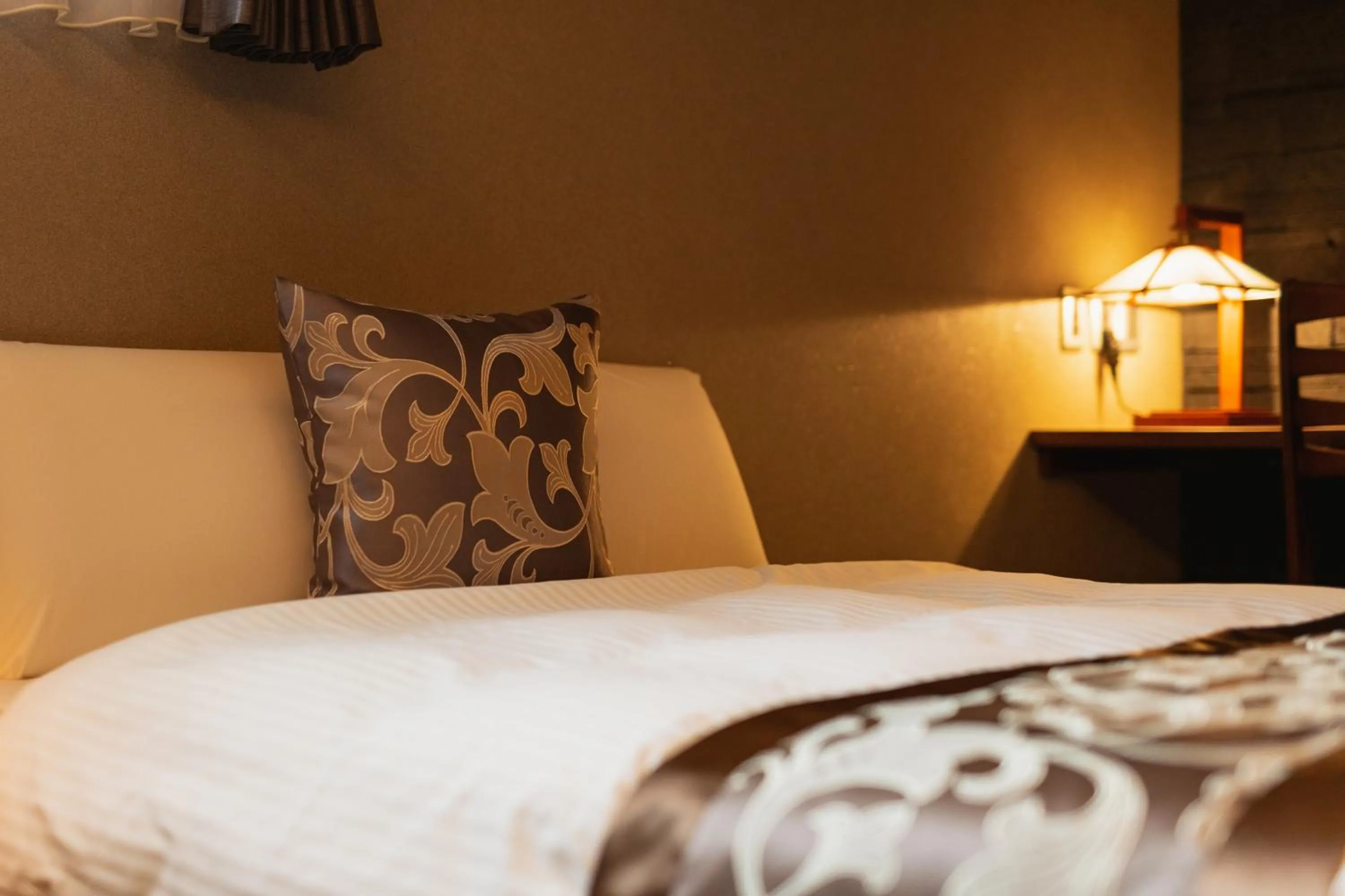 Bed in GRAND BASE Beppu