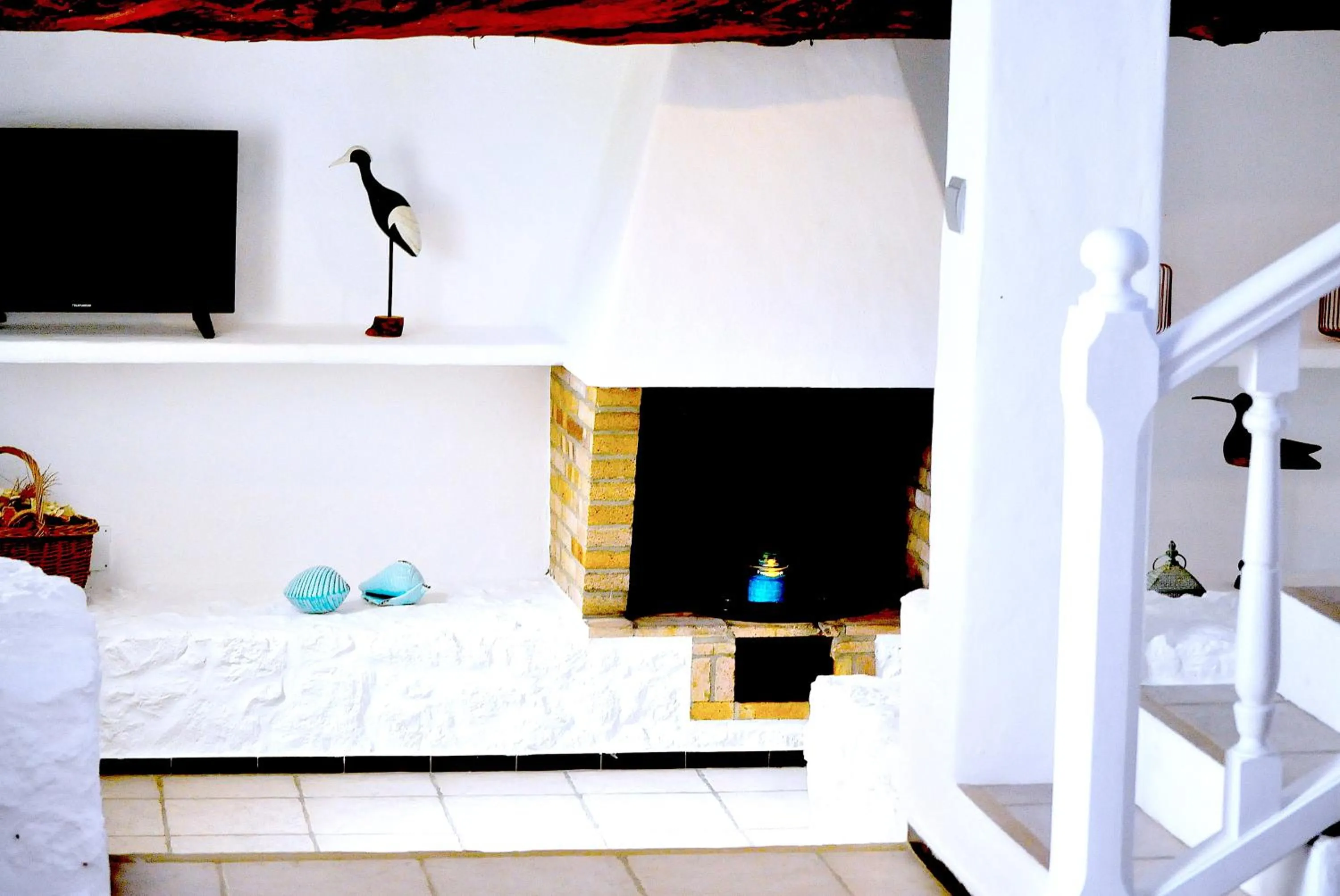 Communal lounge/ TV room, Bed in Bungalows Sa Sargantana