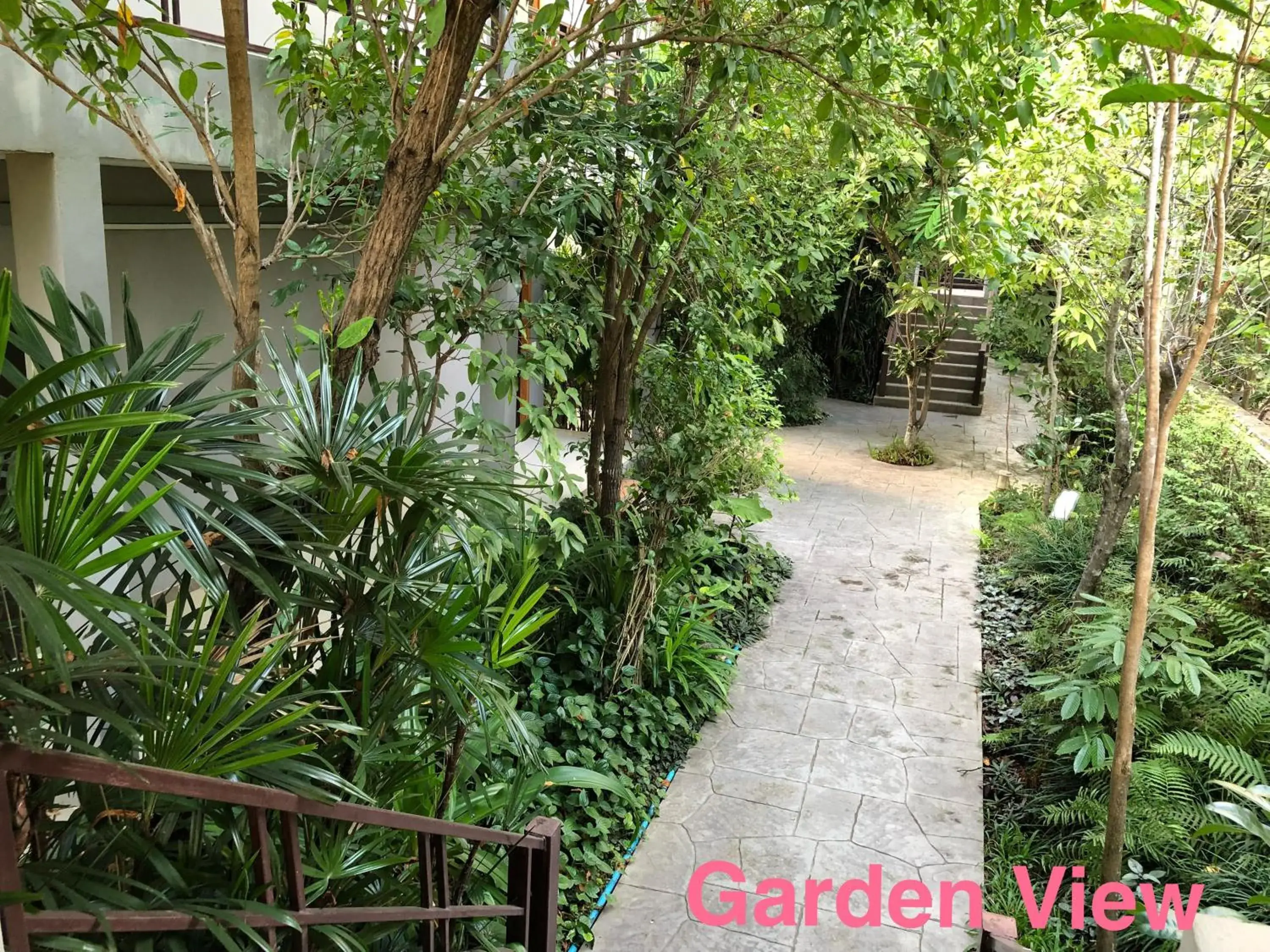 Standard Triple Room in Taman Resort Standard Triple Room in Taman Resort