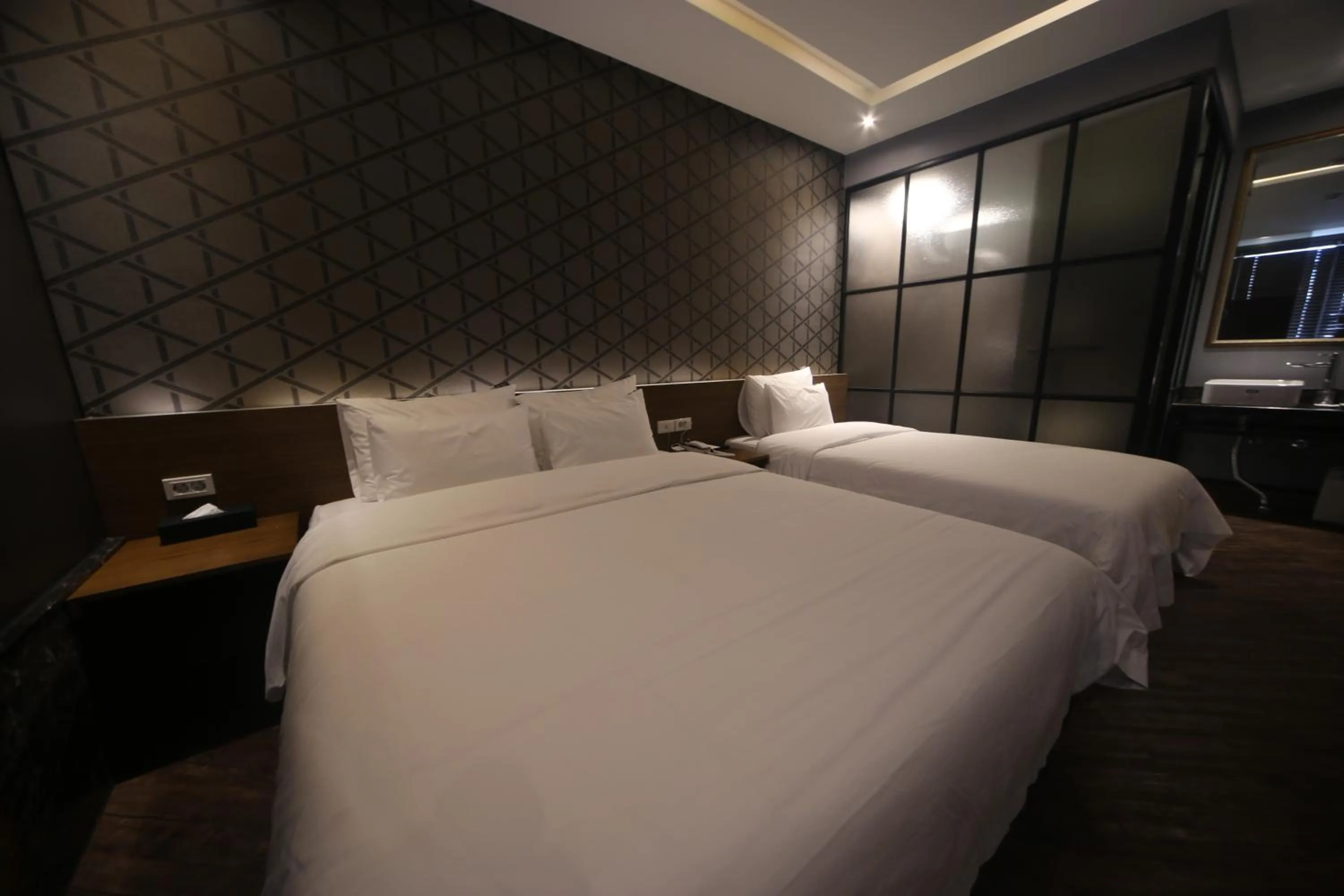 Bed in Beomil Brown Dot Hotel