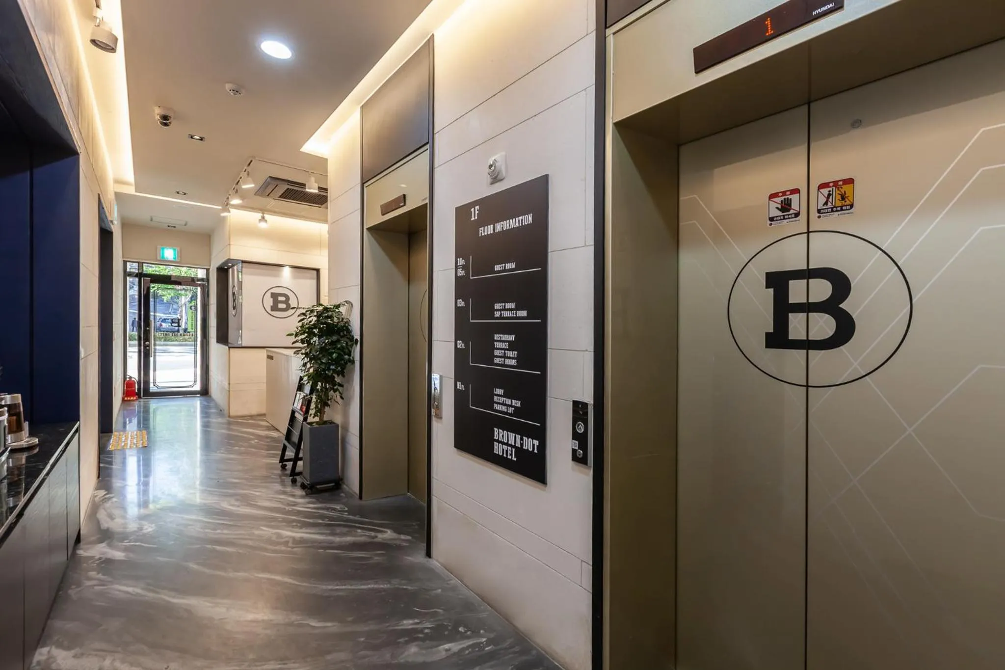 Property logo or sign in Beomil Brown Dot Hotel