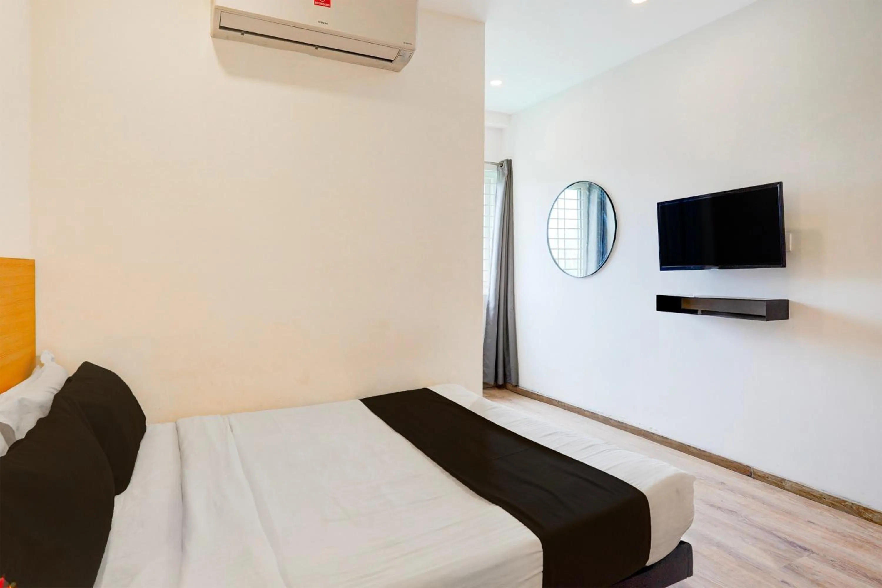 Bedroom, Bed in Super Townhouse Sarjapur Road Formerly Hotel Ace