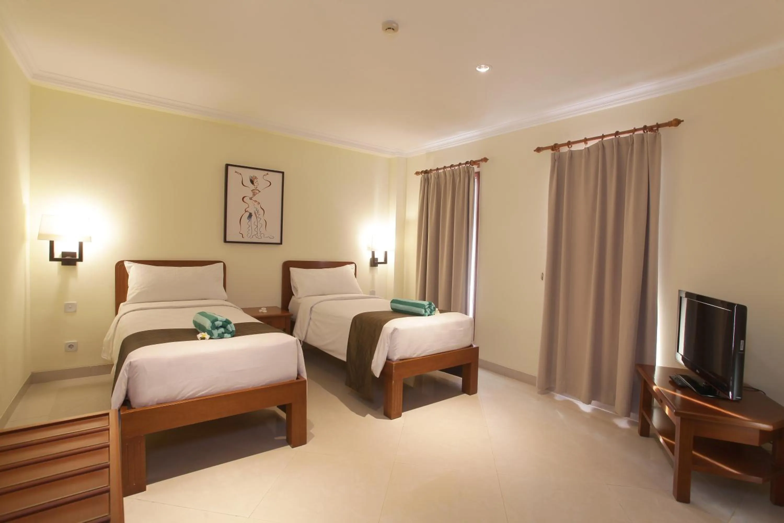 Bed in Peninsula Beach Resort