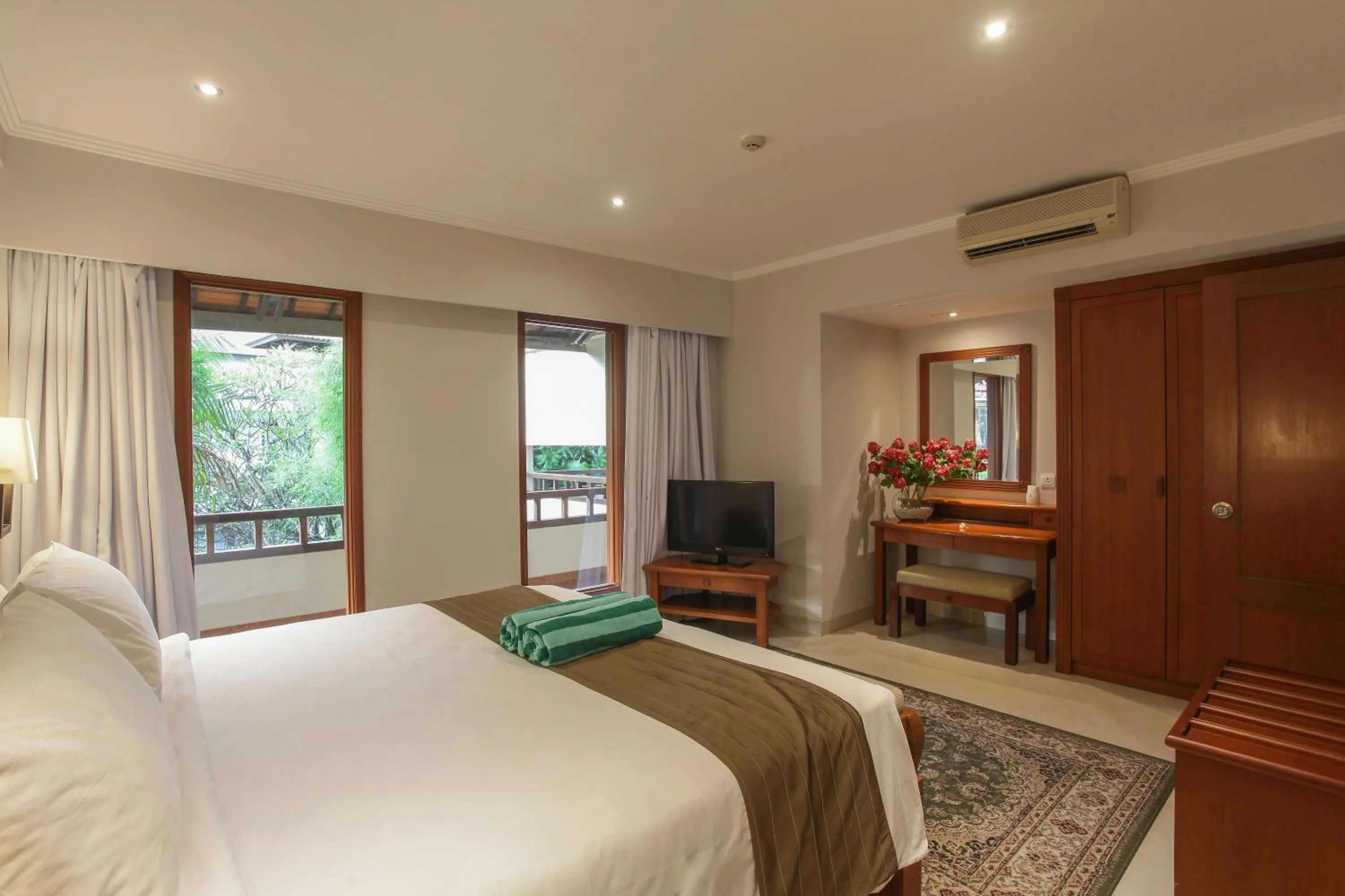 Bed in Peninsula Beach Resort