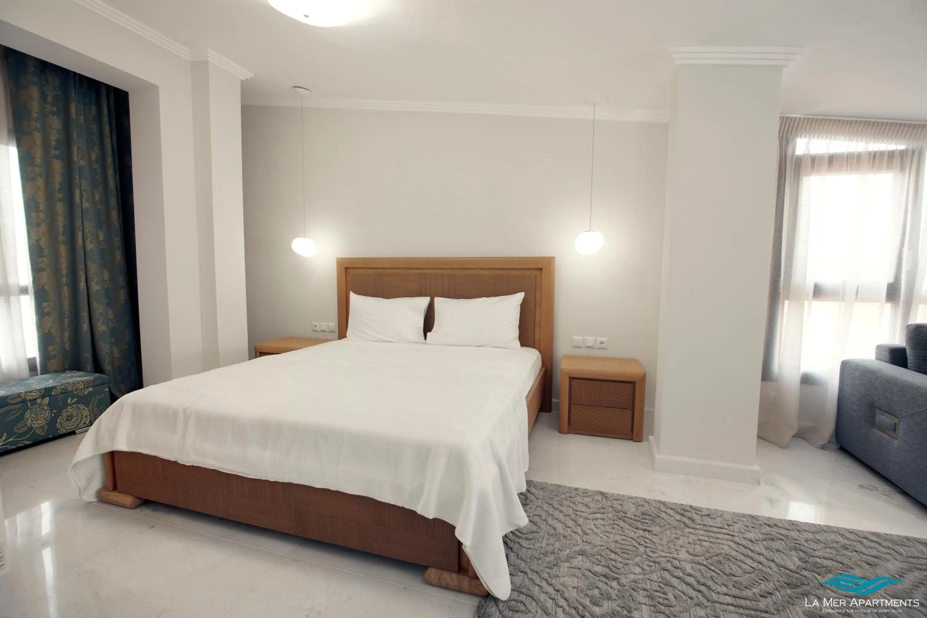 Bed in La Mer Apartments