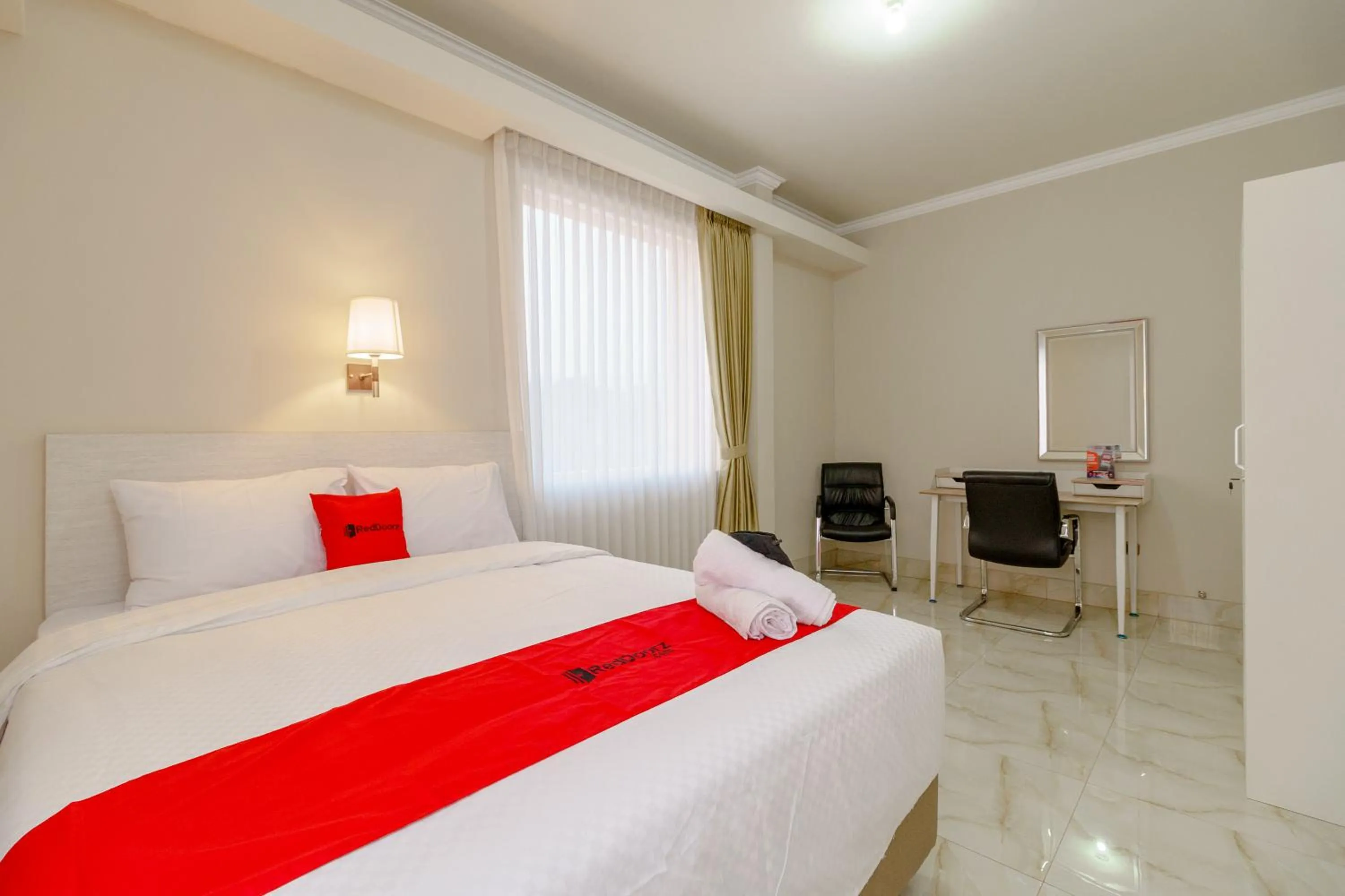 Bed in RedDoorz near Taman Makam Pahlawan Cikutra