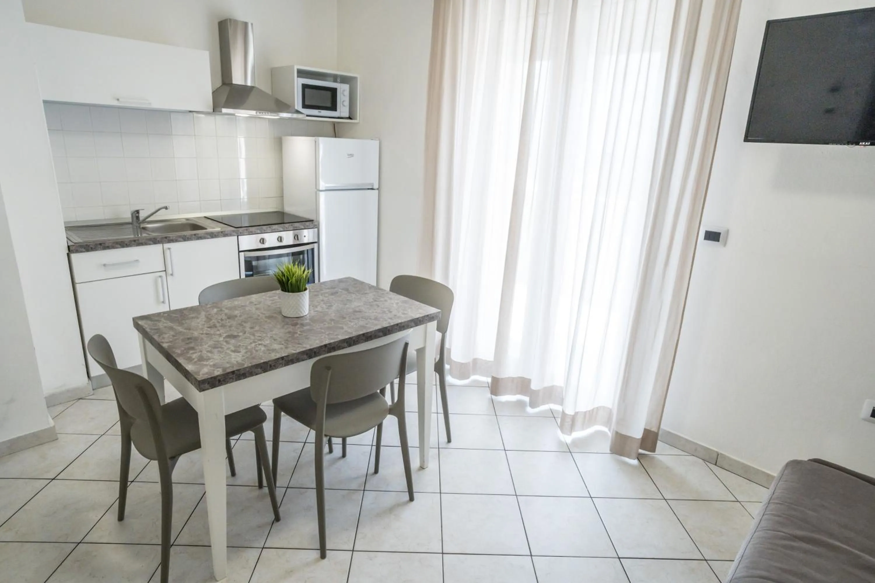 Kitchen or kitchenette in Rimini Bay Suites&Residence
