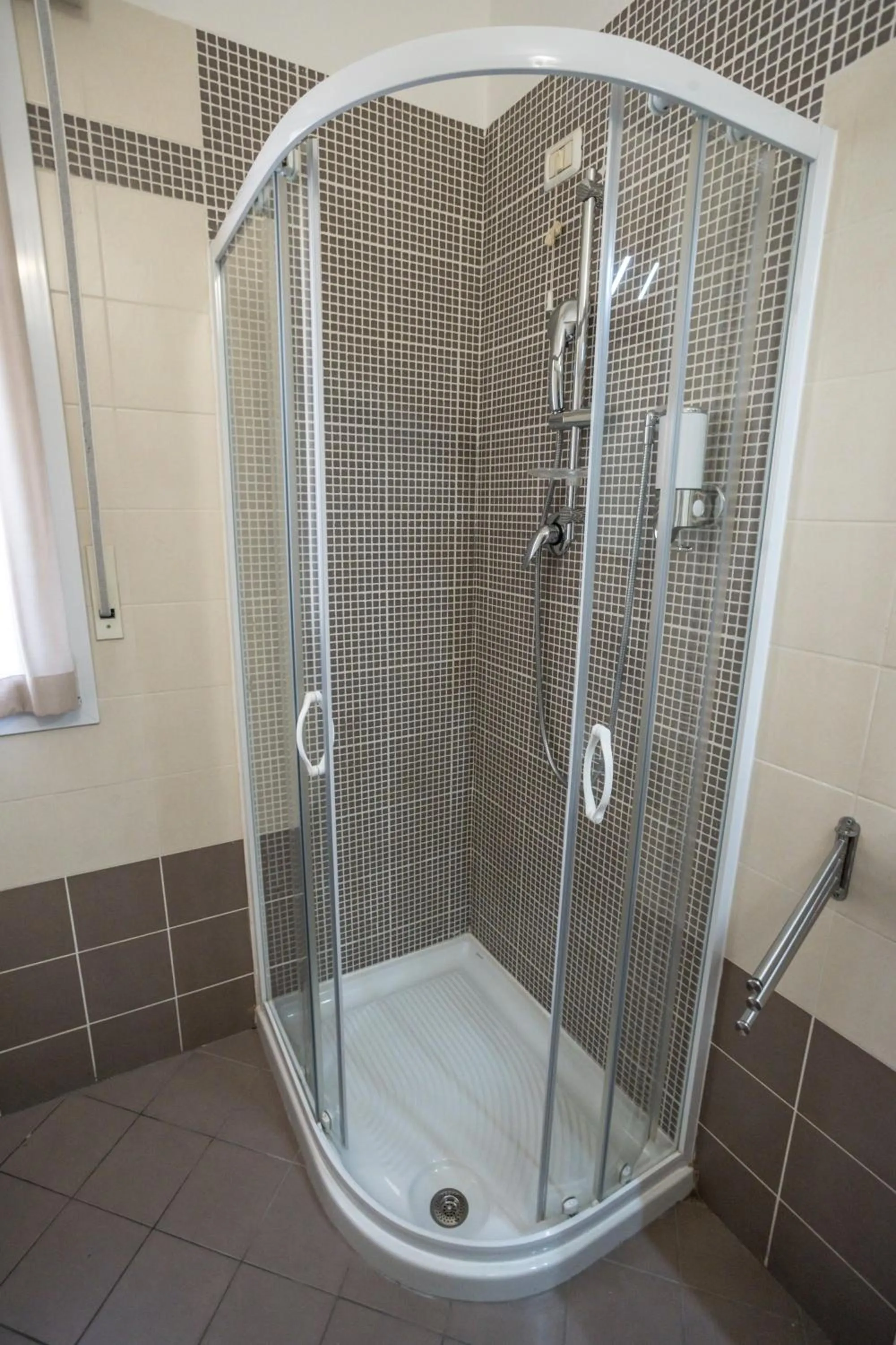 Shower in Rimini Bay Suites&Residence