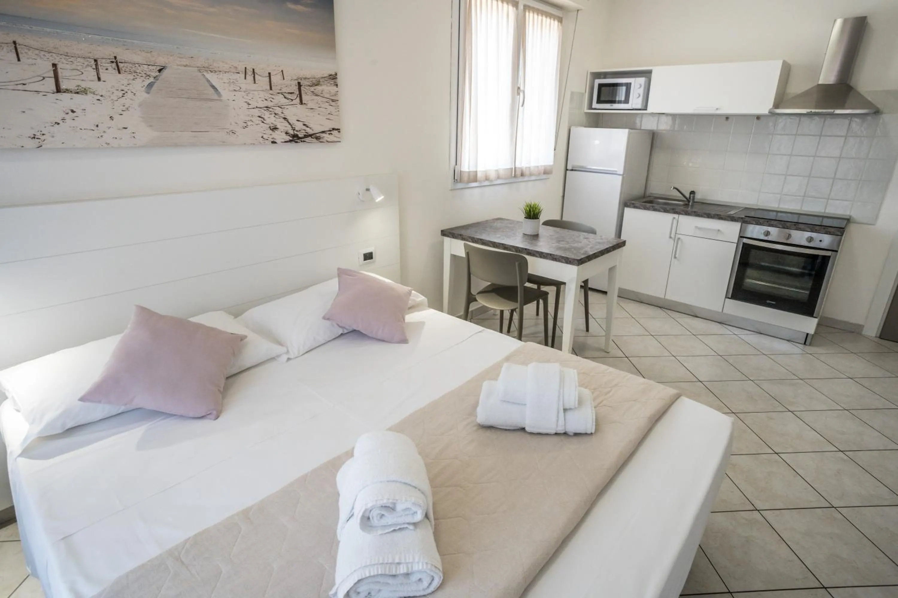 Bed in Rimini Bay Suites&Residence