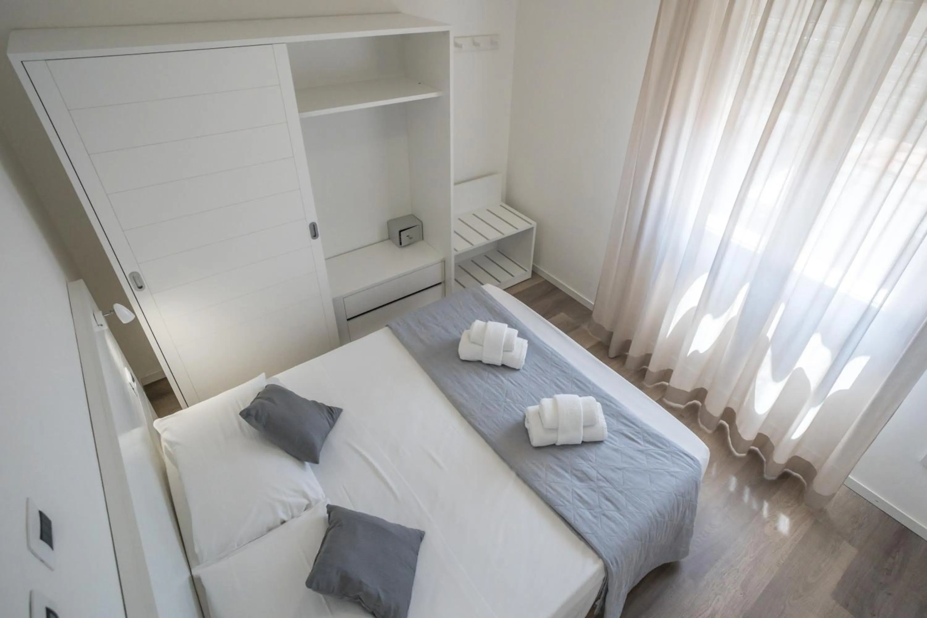 Bed in Rimini Bay Suites&Residence