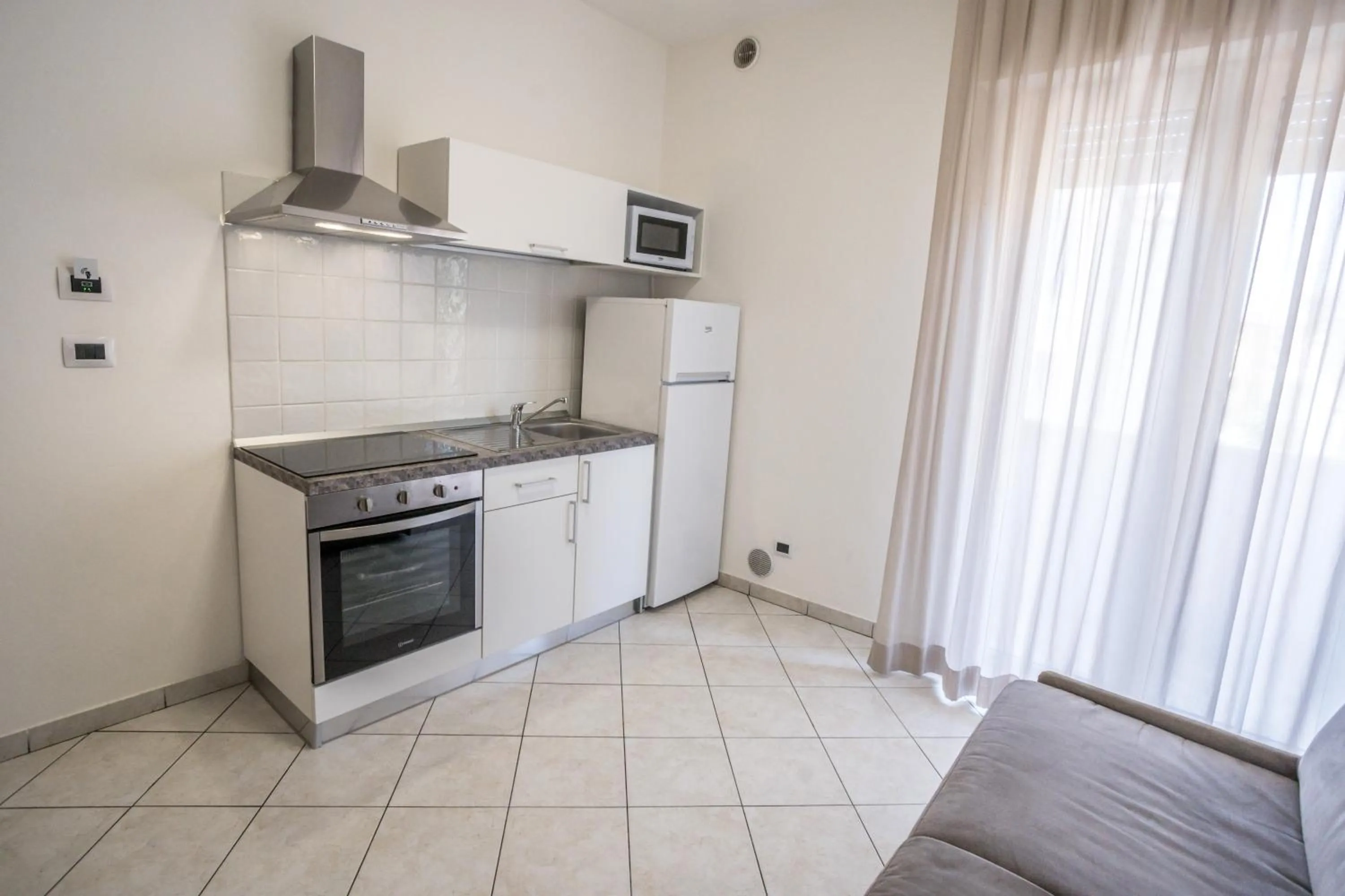 Kitchen or kitchenette in Rimini Bay Suites&Residence