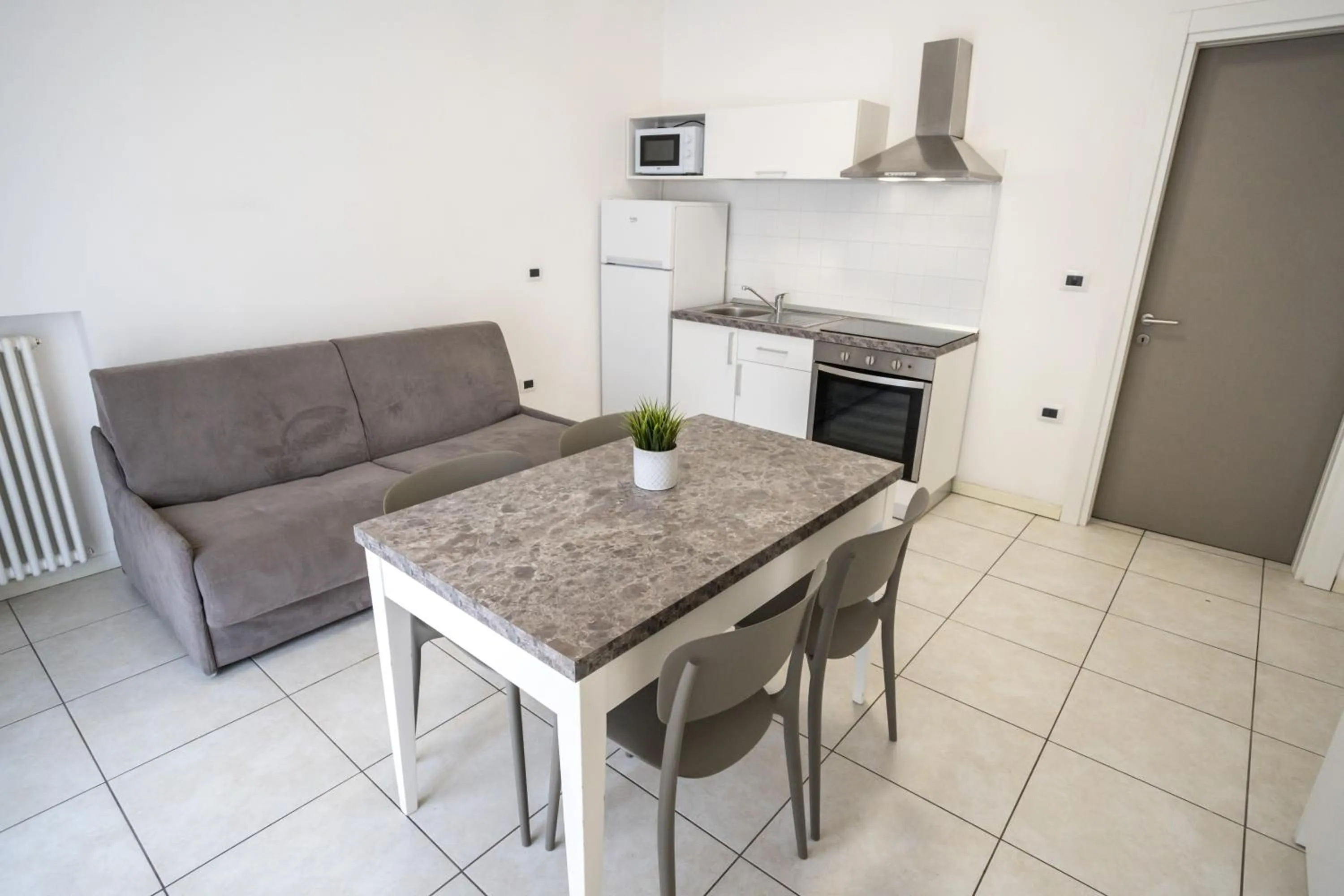 Kitchen or kitchenette in Rimini Bay Suites&Residence