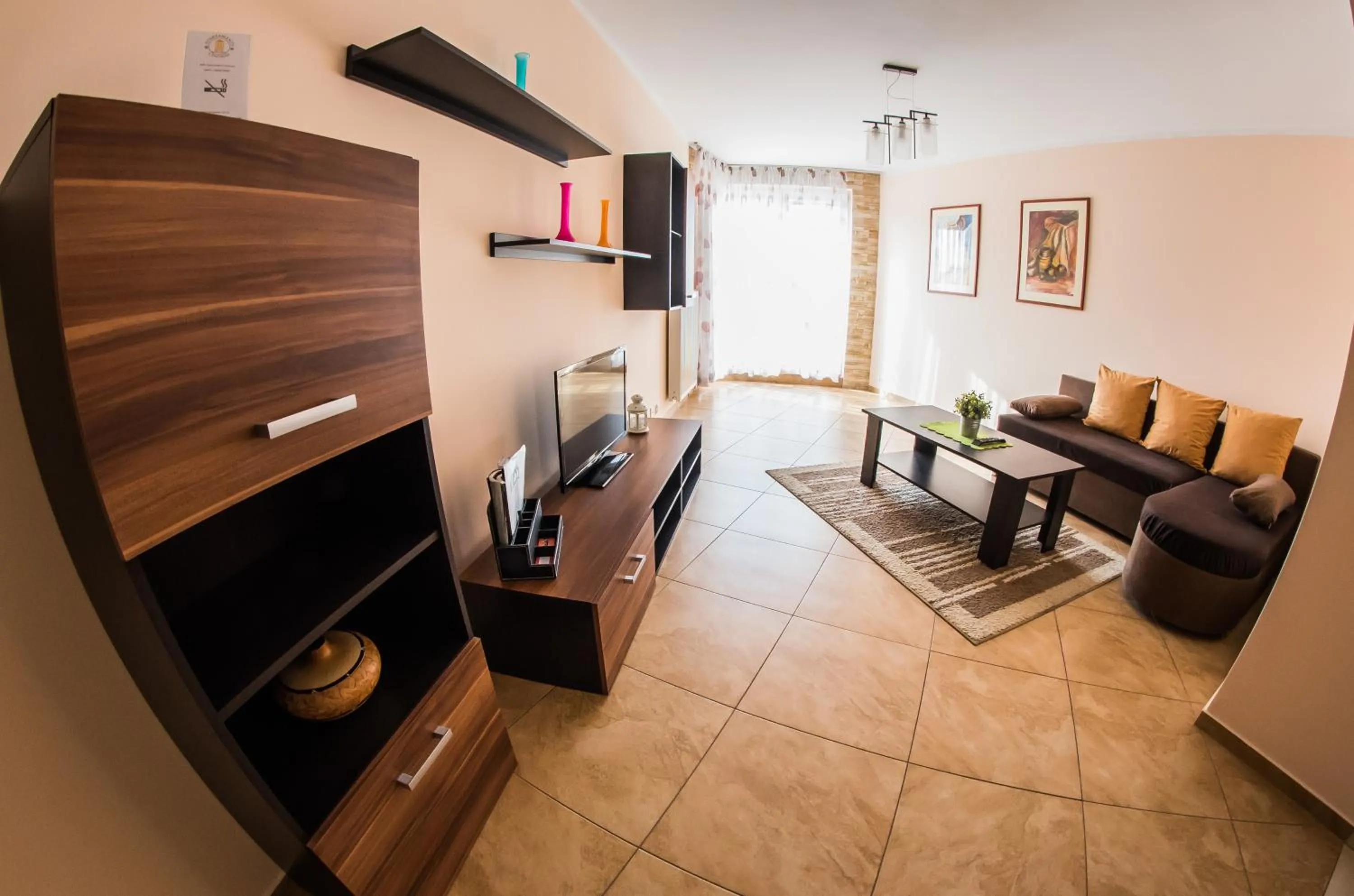 Communal lounge/ TV room in Apartamenty Centrum