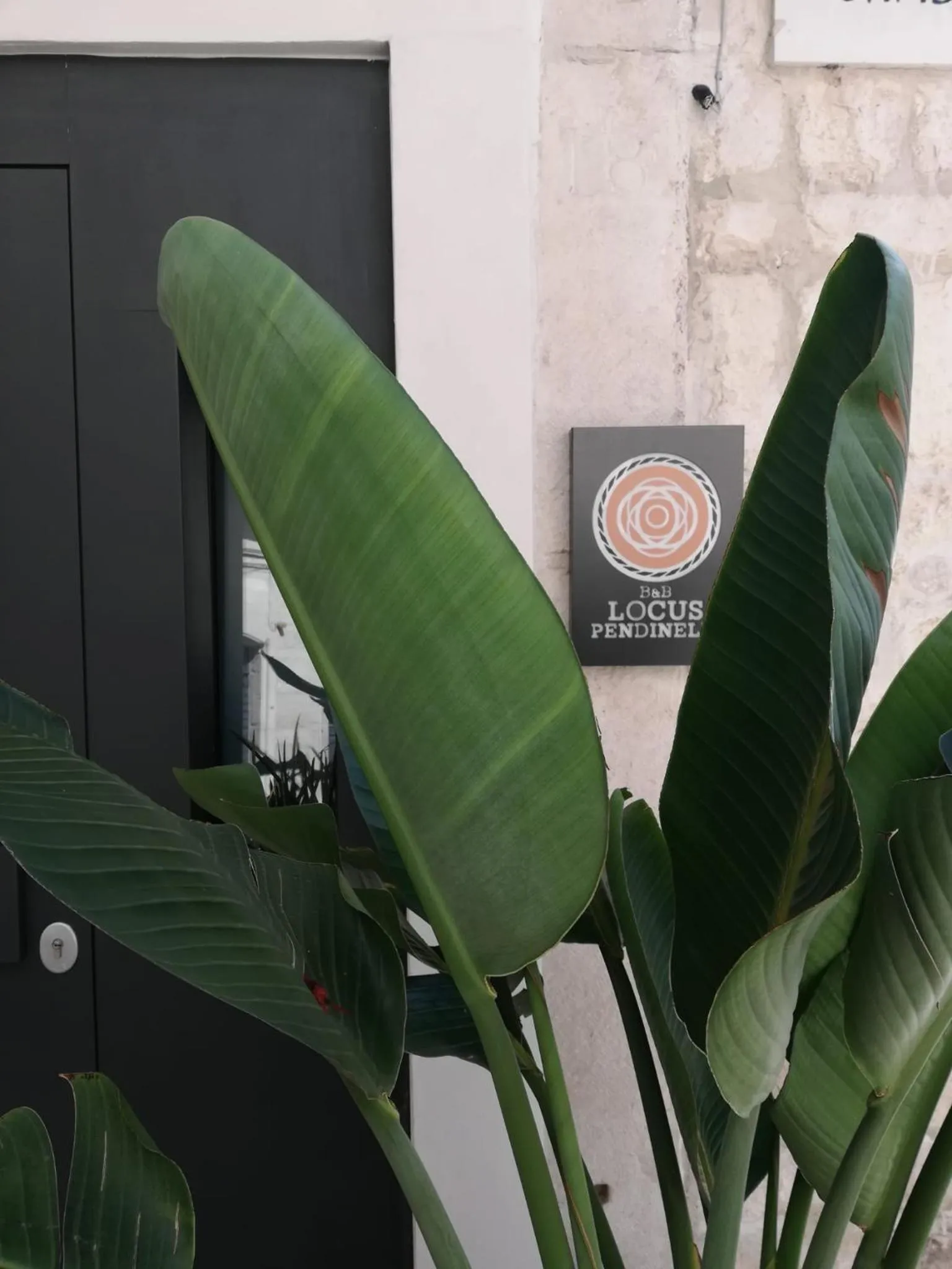 Property logo or sign in Locus Pendinelli Trani