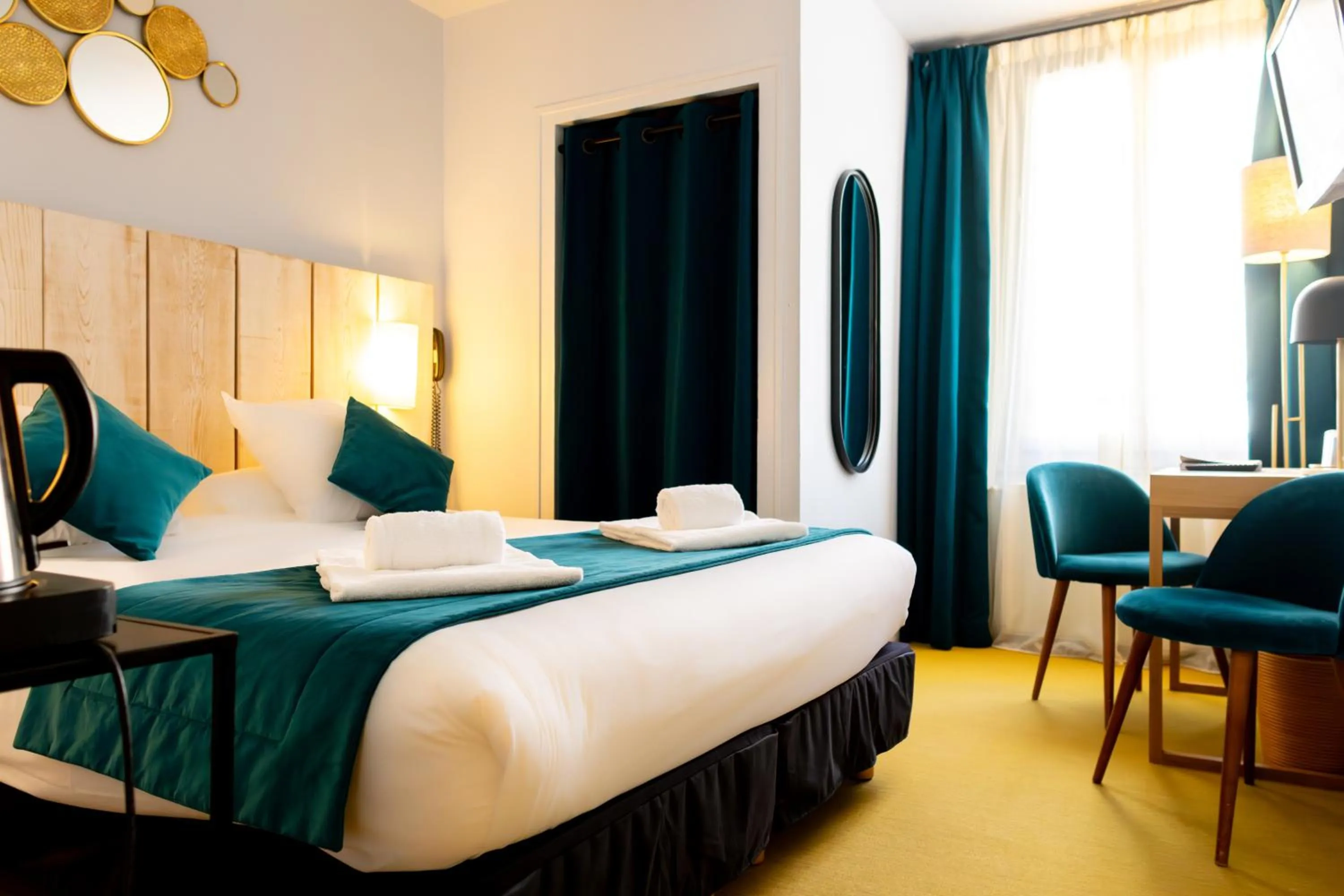 Bed in Le Central Boutique Hôtel