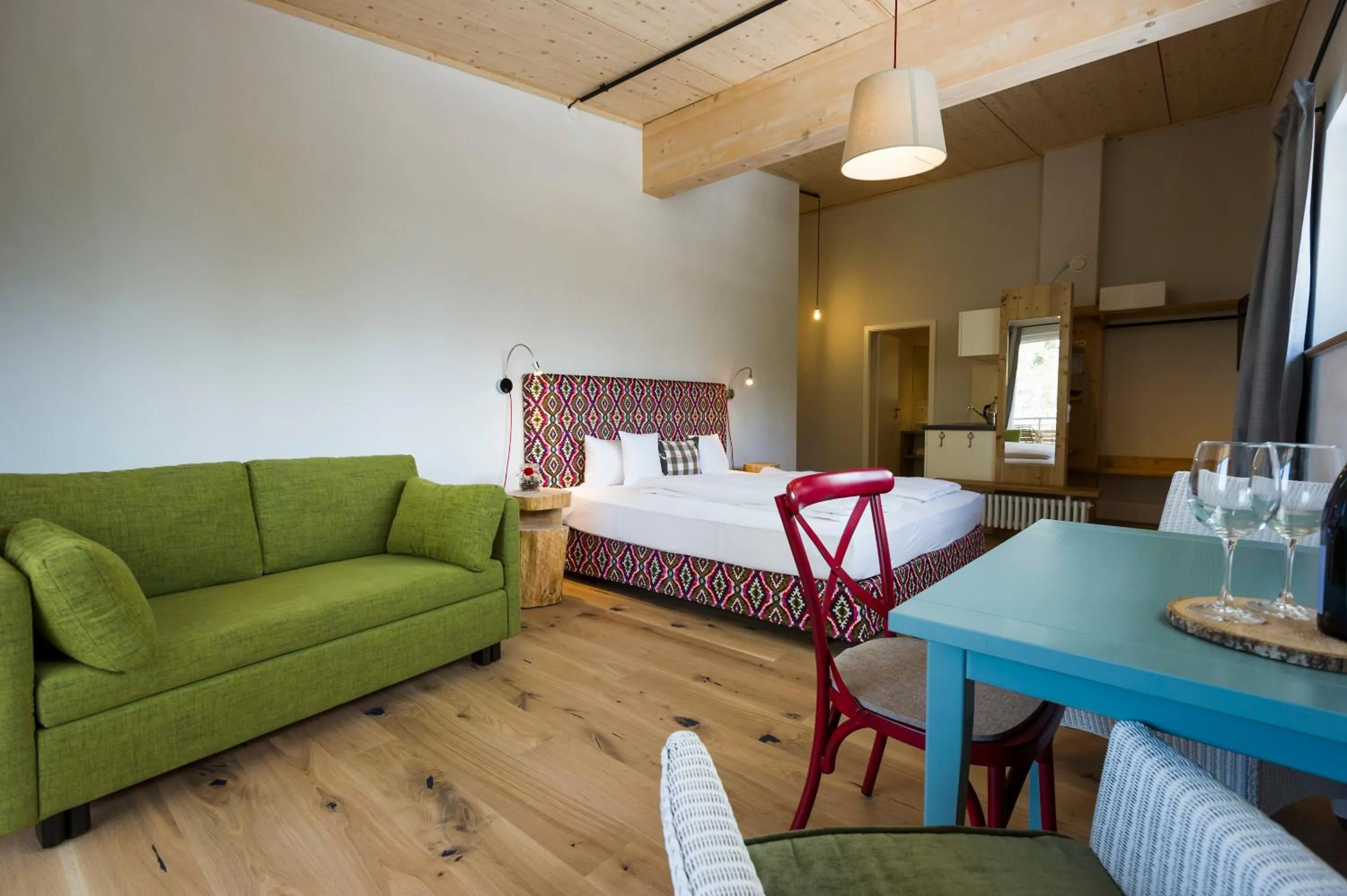 Living room, Bed in Berghaus Freiburg - Appartement Hotel auf dem Schauinsland