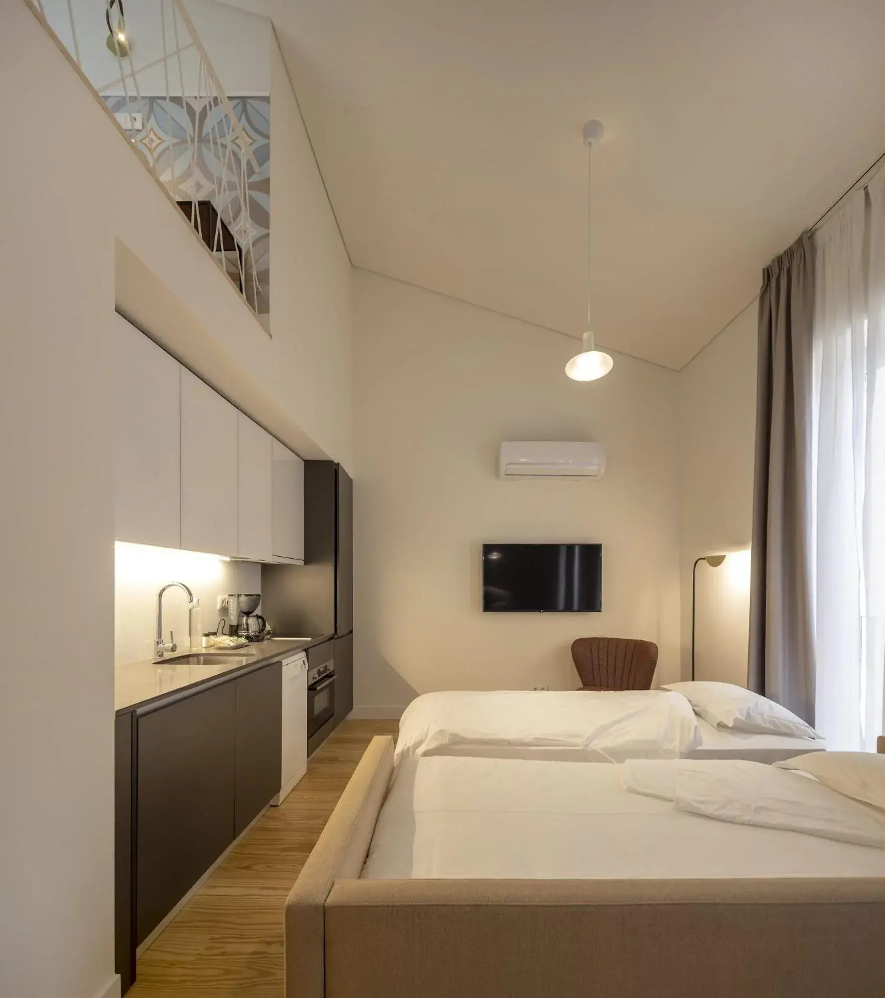 Living room, Bed in Lisbon Serviced Apartments - Santos Living room, Bed in Lisbon Serviced Apartments - Santos