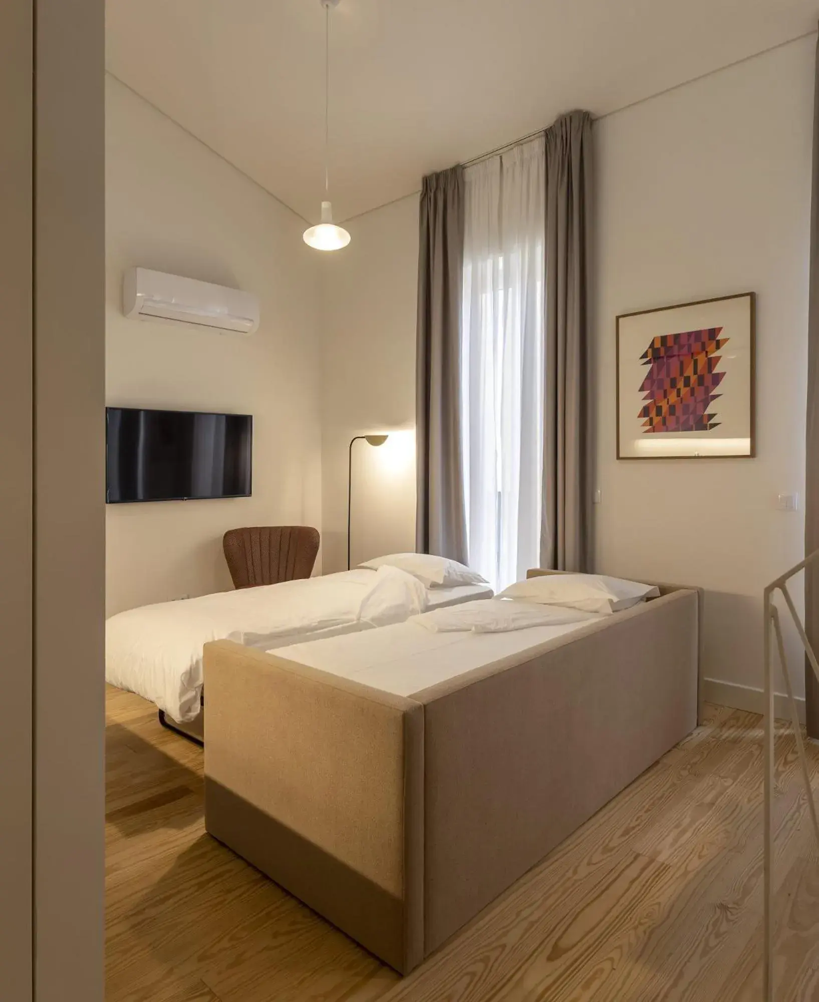 Living room, Bed in Lisbon Serviced Apartments - Santos Living room, Bed in Lisbon Serviced Apartments - Santos