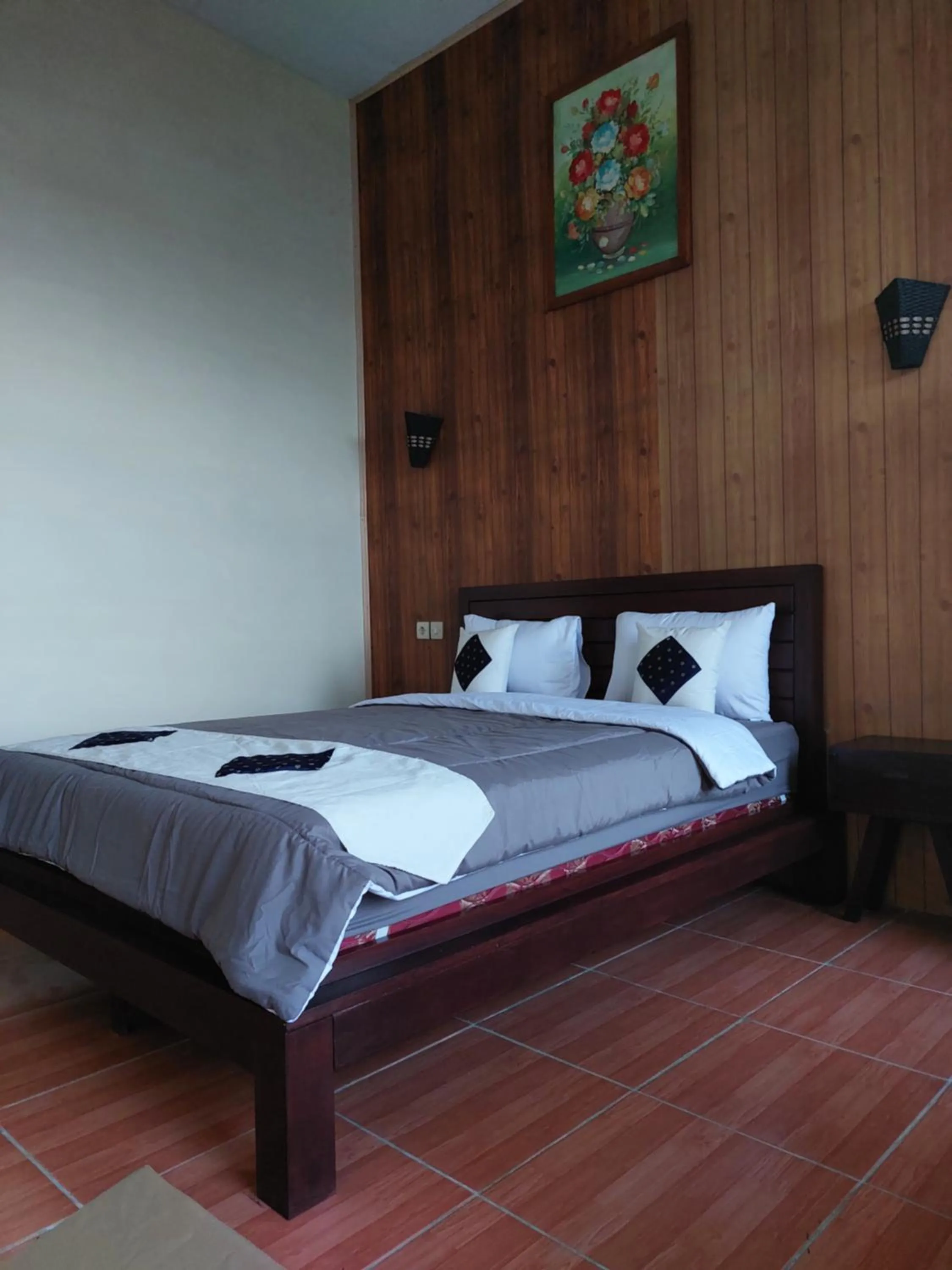 Bed in Bliss family cottage Batu