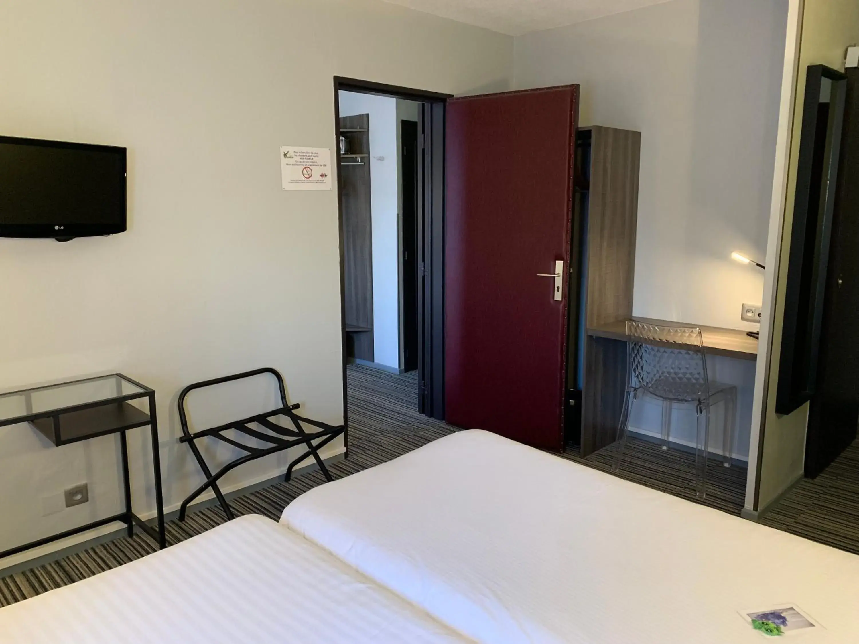 Bed in Hôtel Bagatelle Bed in Hôtel Bagatelle