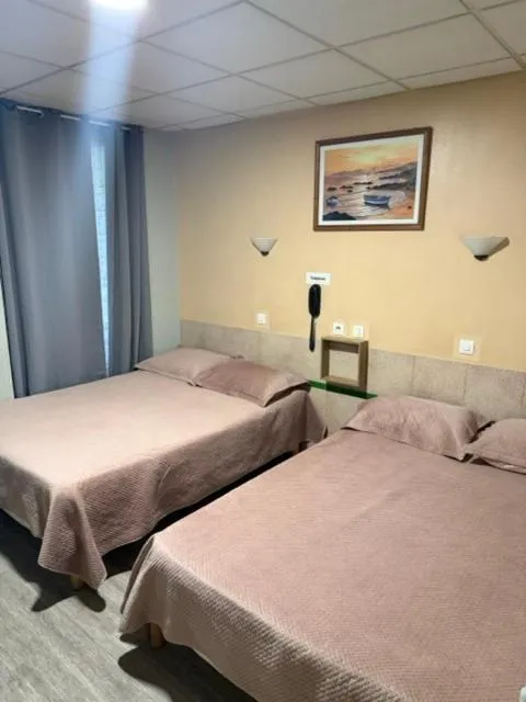 Bed in Hôtel Jarry Confort