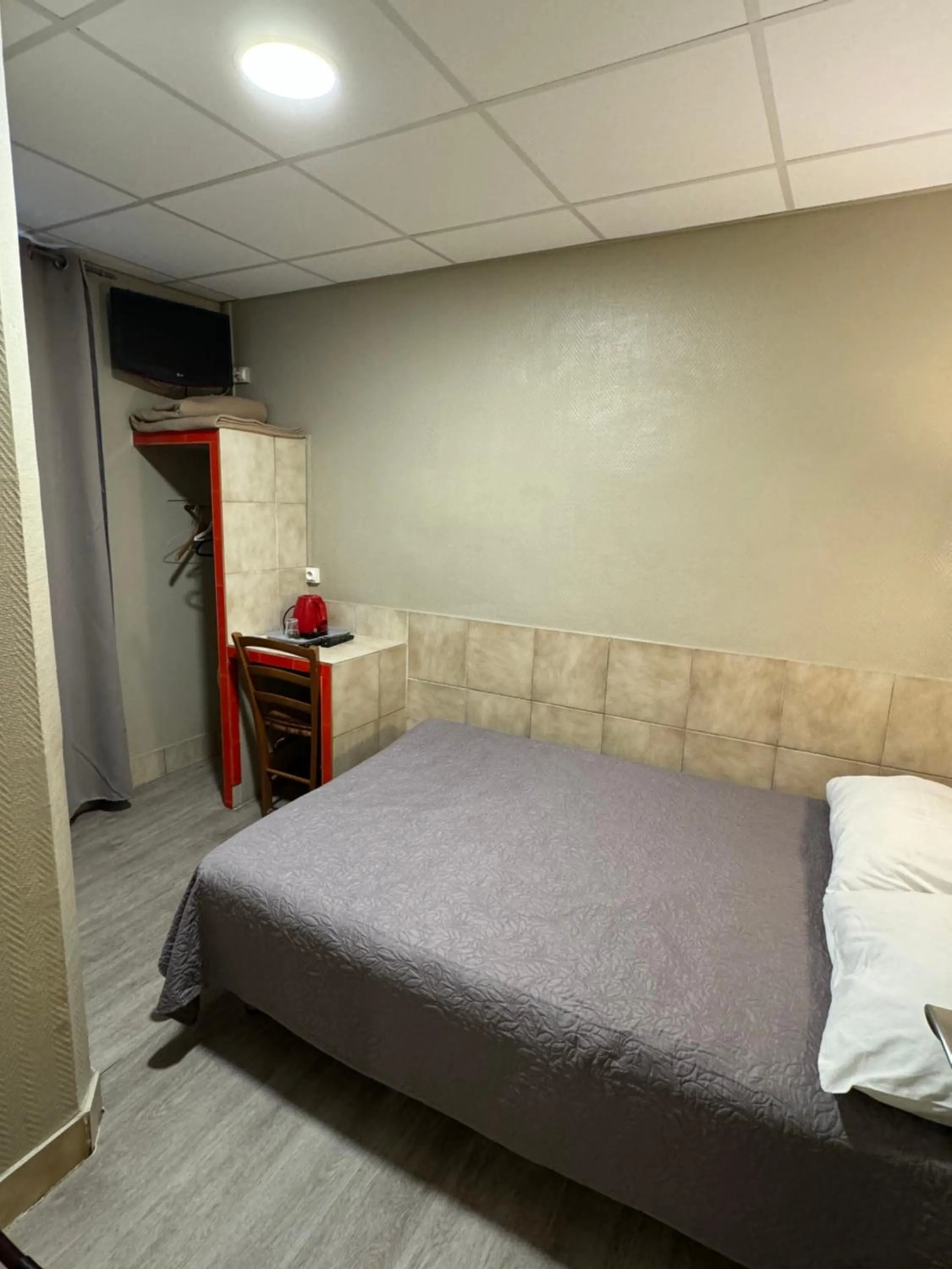 Bed in Hôtel Jarry Confort