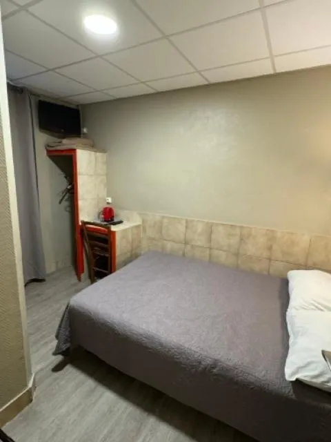 Bed in Hôtel Jarry Confort