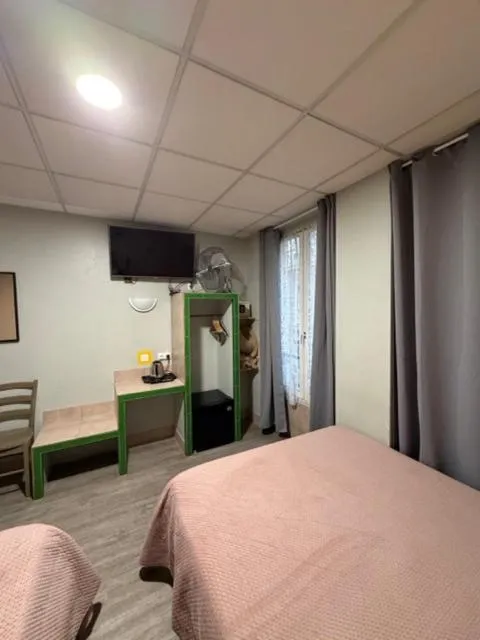 Bed in Hôtel Jarry Confort