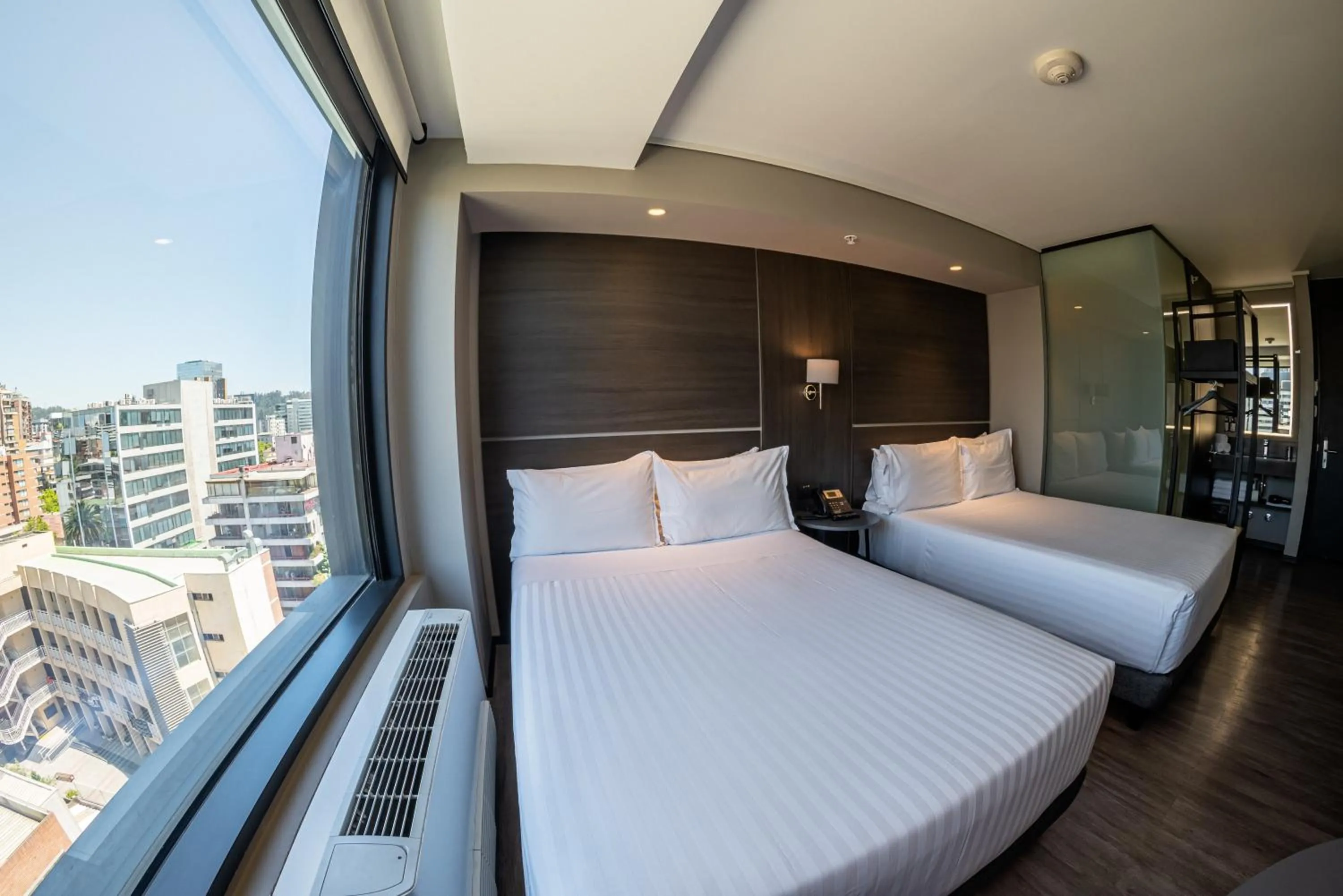 Bed in Ola Santiago Providencia, Tapestry Collection by Hilton