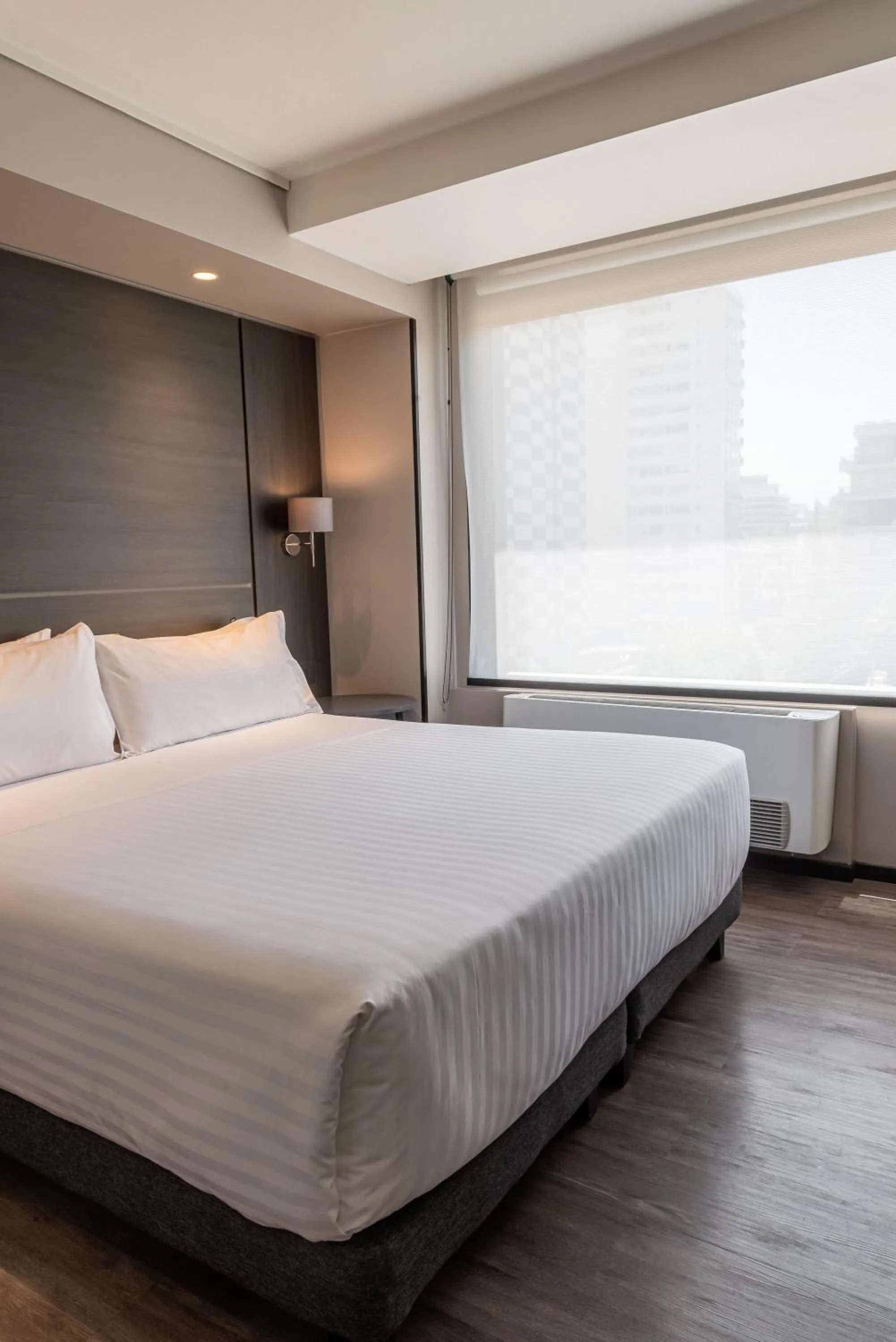 Bed in Ola Santiago Providencia, Tapestry Collection by Hilton