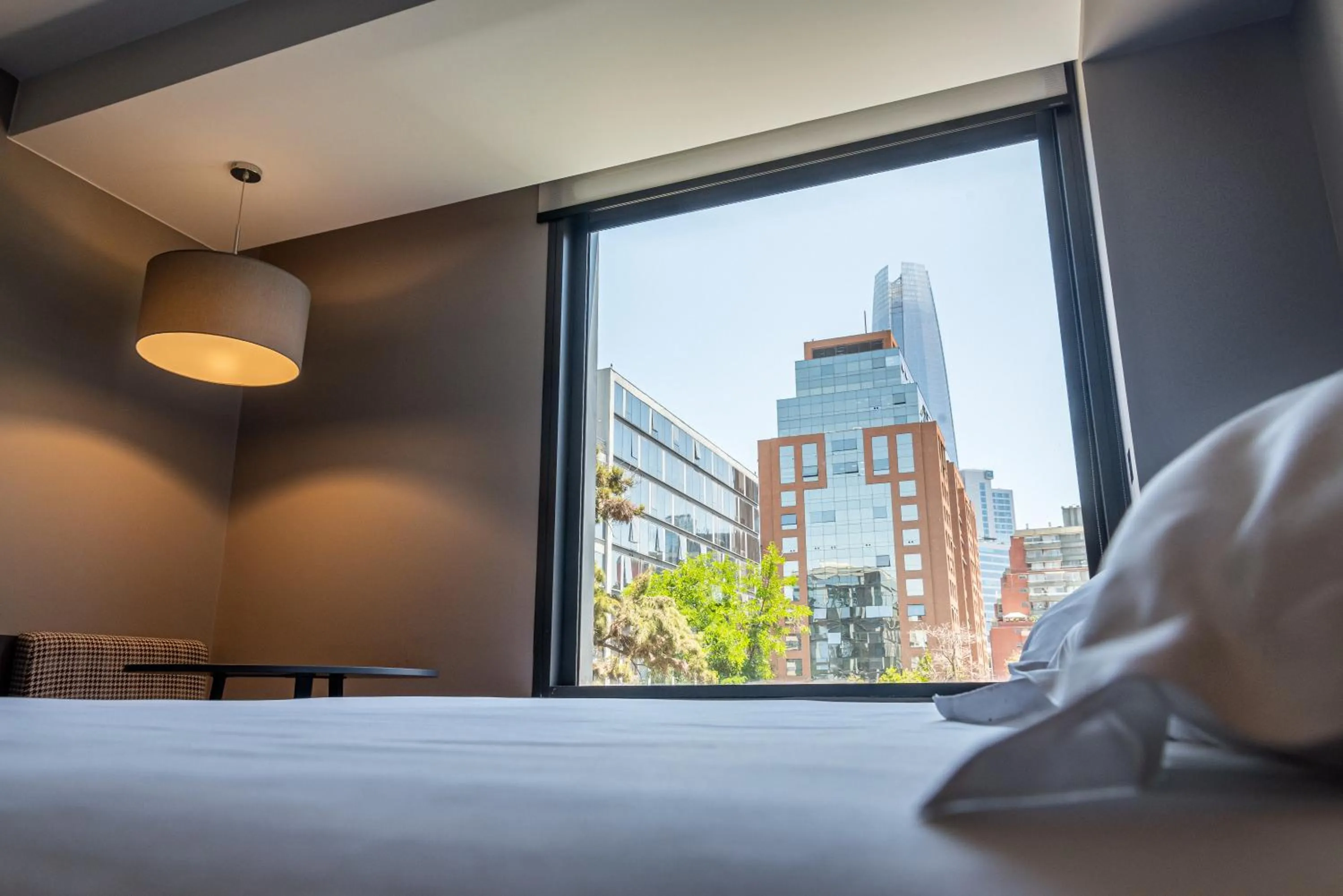 Bed in Ola Santiago Providencia, Tapestry Collection by Hilton