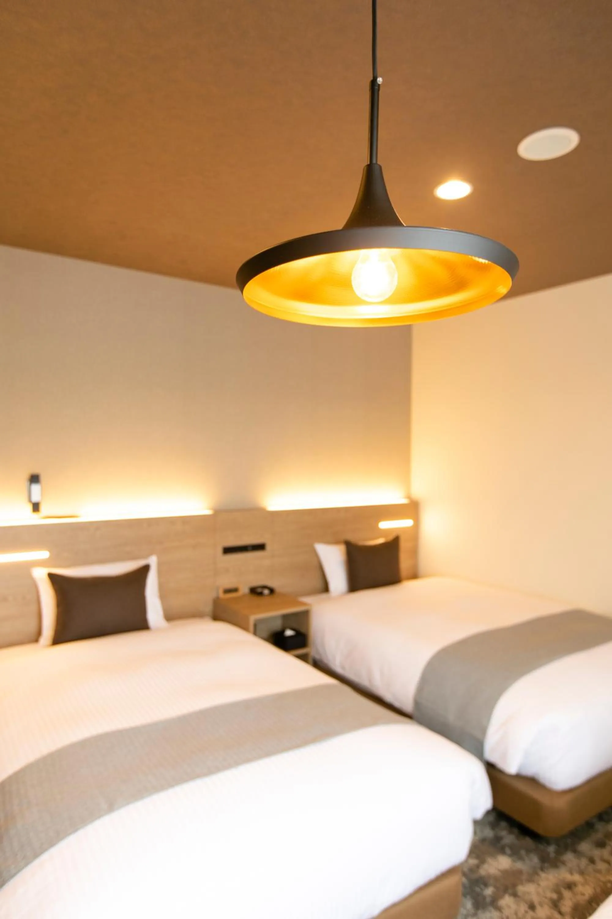 Photo of the whole room, Bed in KOKO HOTEL Sapporo Susukino - formerly Hotel Wing International Sapporo Susukino