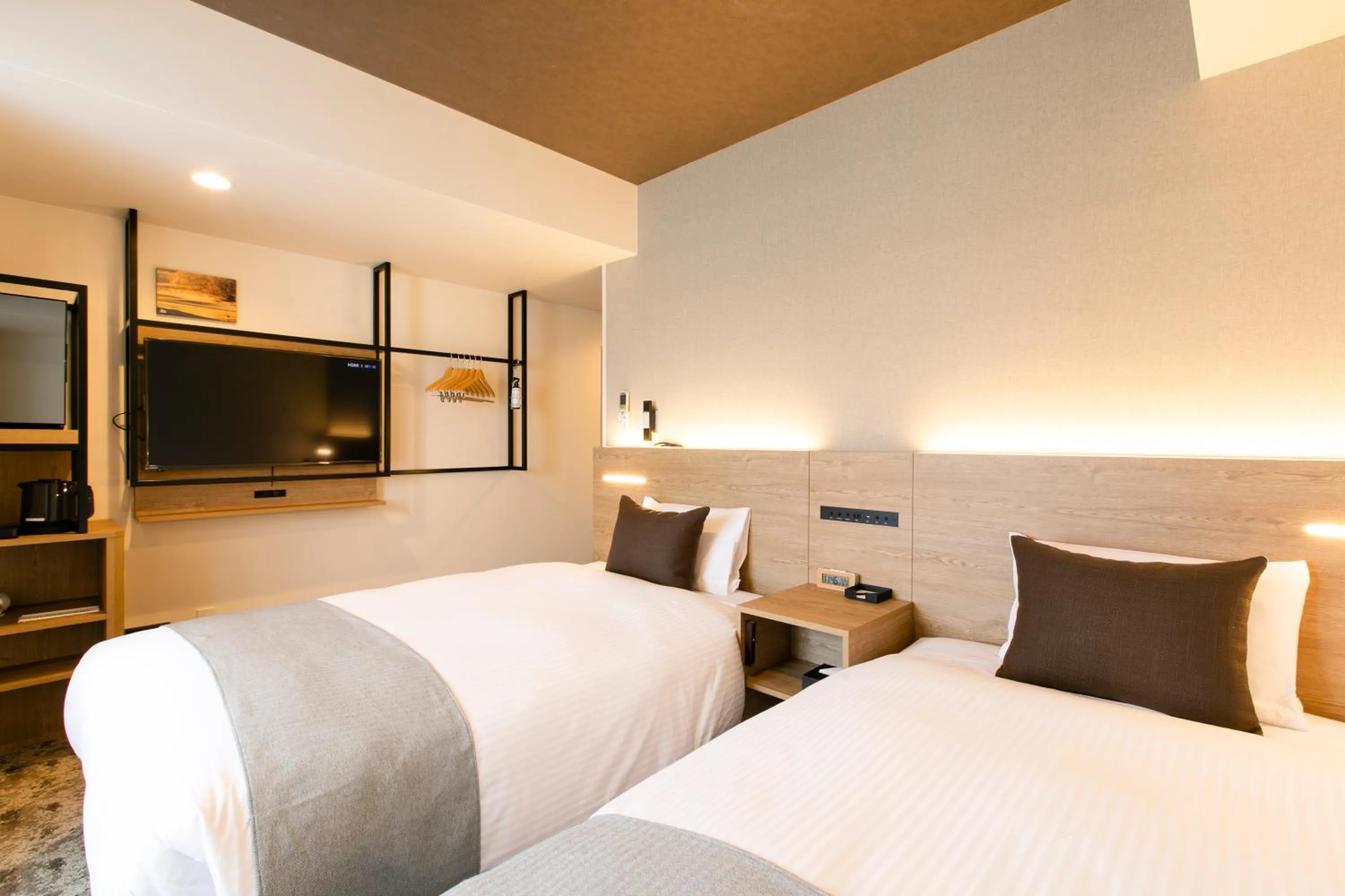 Photo of the whole room, Bed in KOKO HOTEL Sapporo Susukino - formerly Hotel Wing International Sapporo Susukino