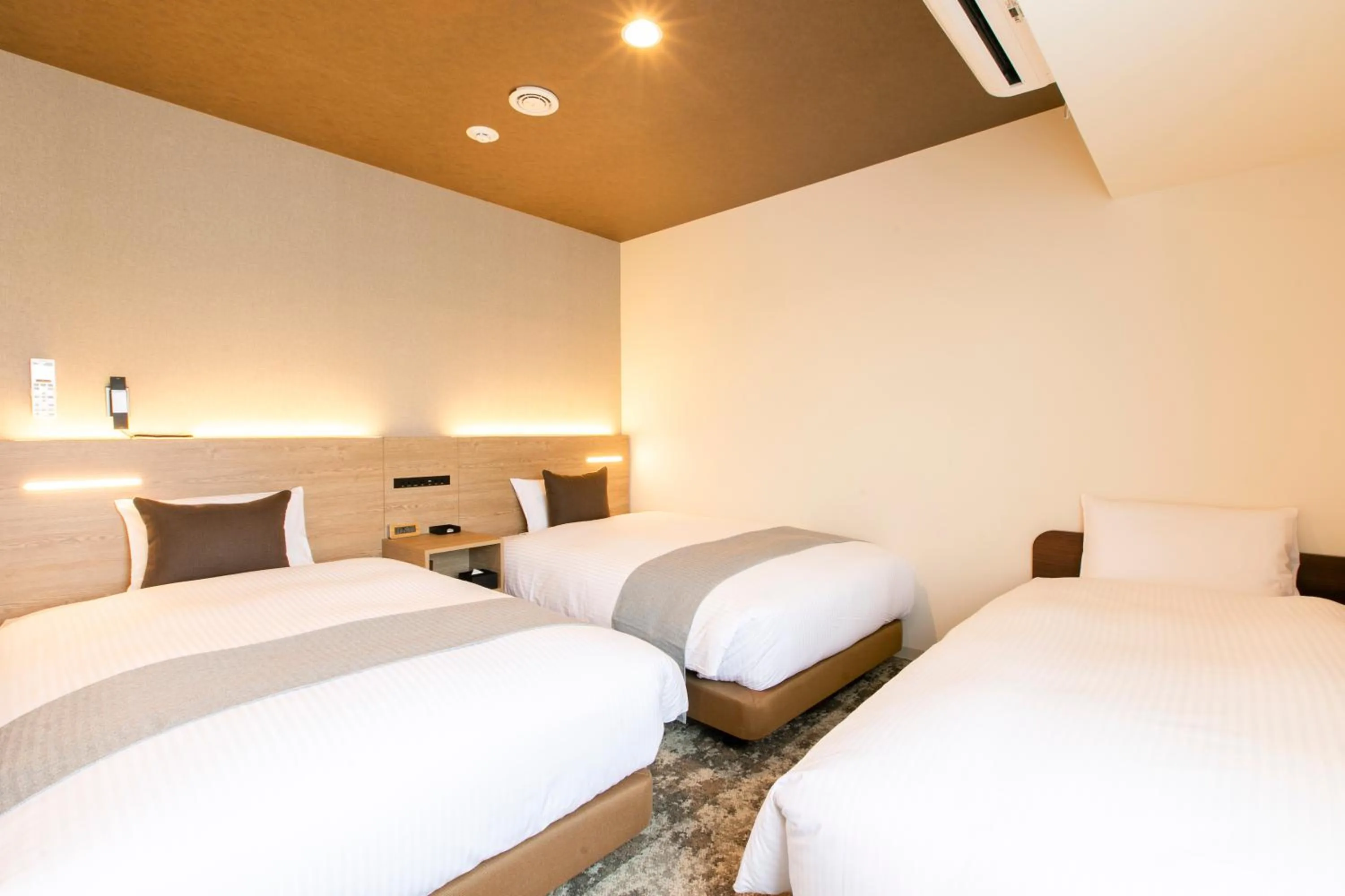 Photo of the whole room, Bed in KOKO HOTEL Sapporo Susukino - formerly Hotel Wing International Sapporo Susukino