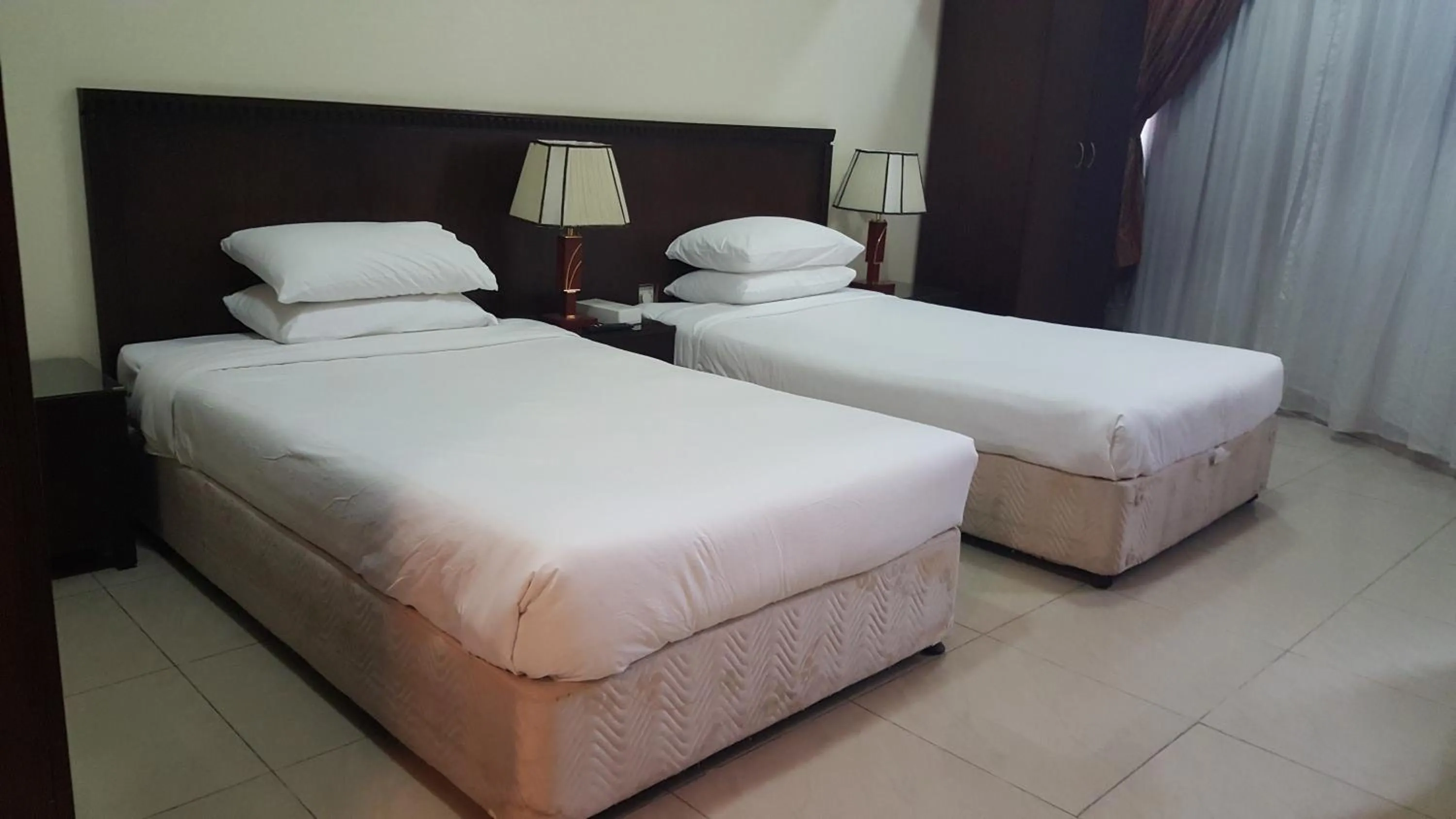 Bed in Al Muntazah Plaza Hotel