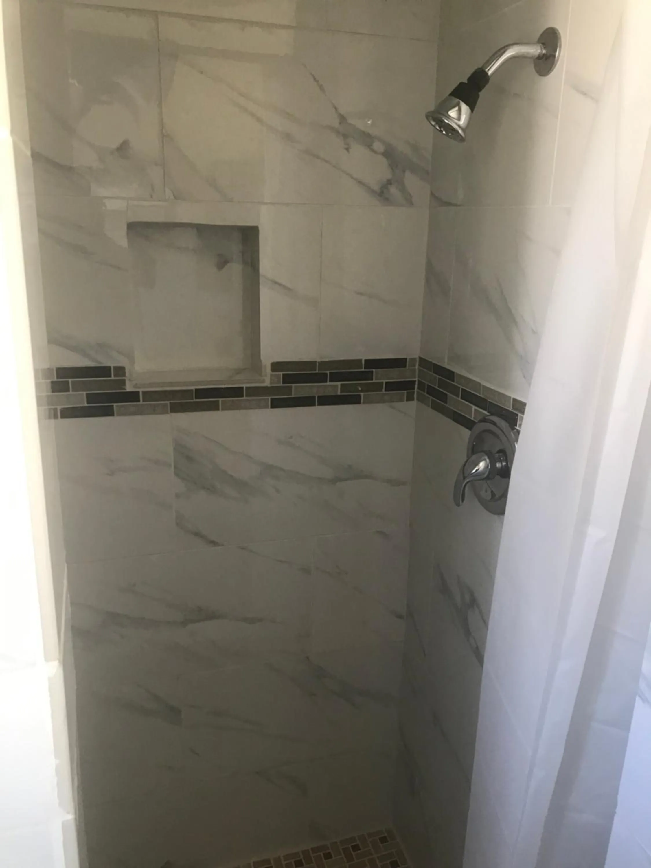 Shower in All 8 Motel