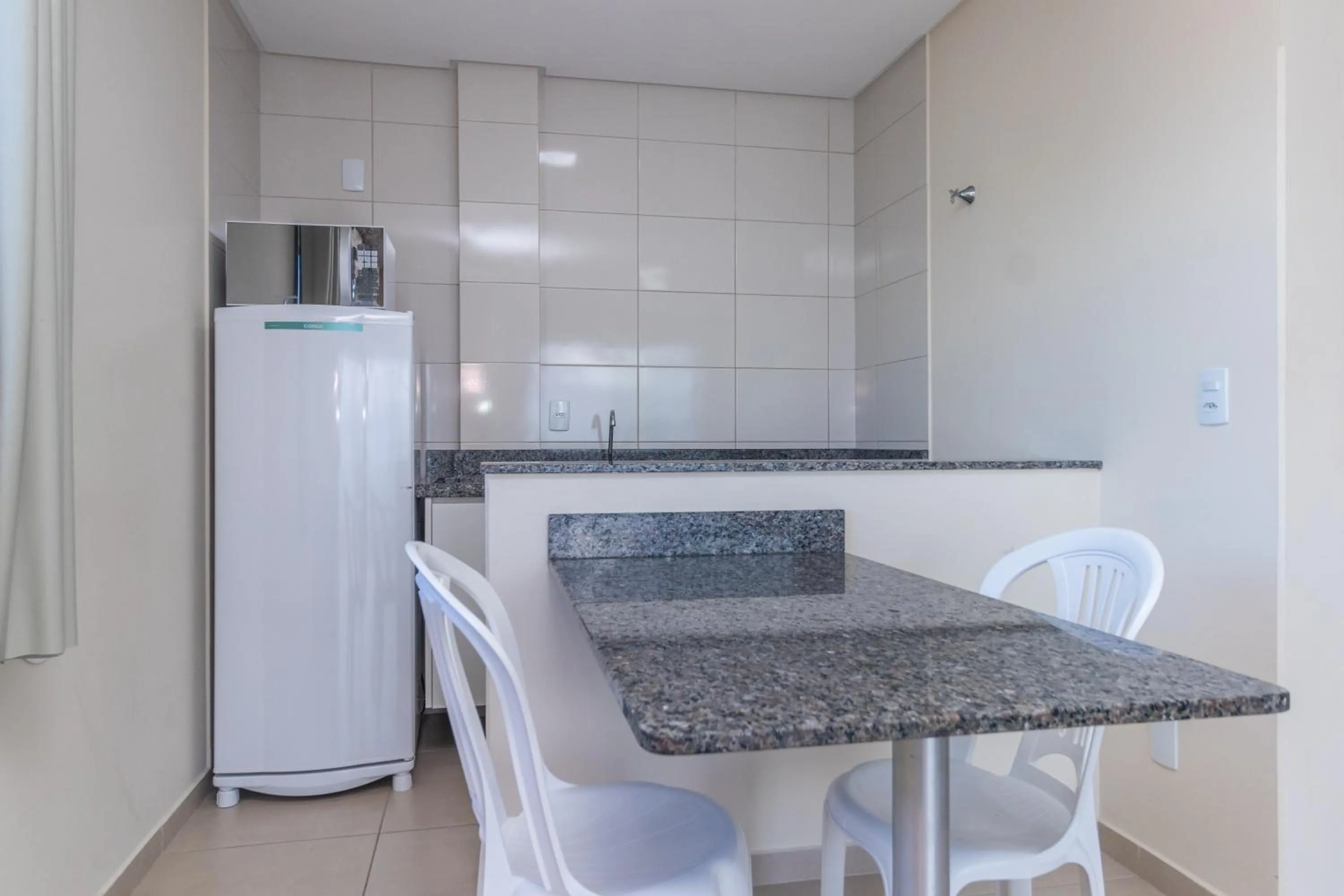 Kitchen or kitchenette in Pousada Bella Bombinhas - Pé na areia