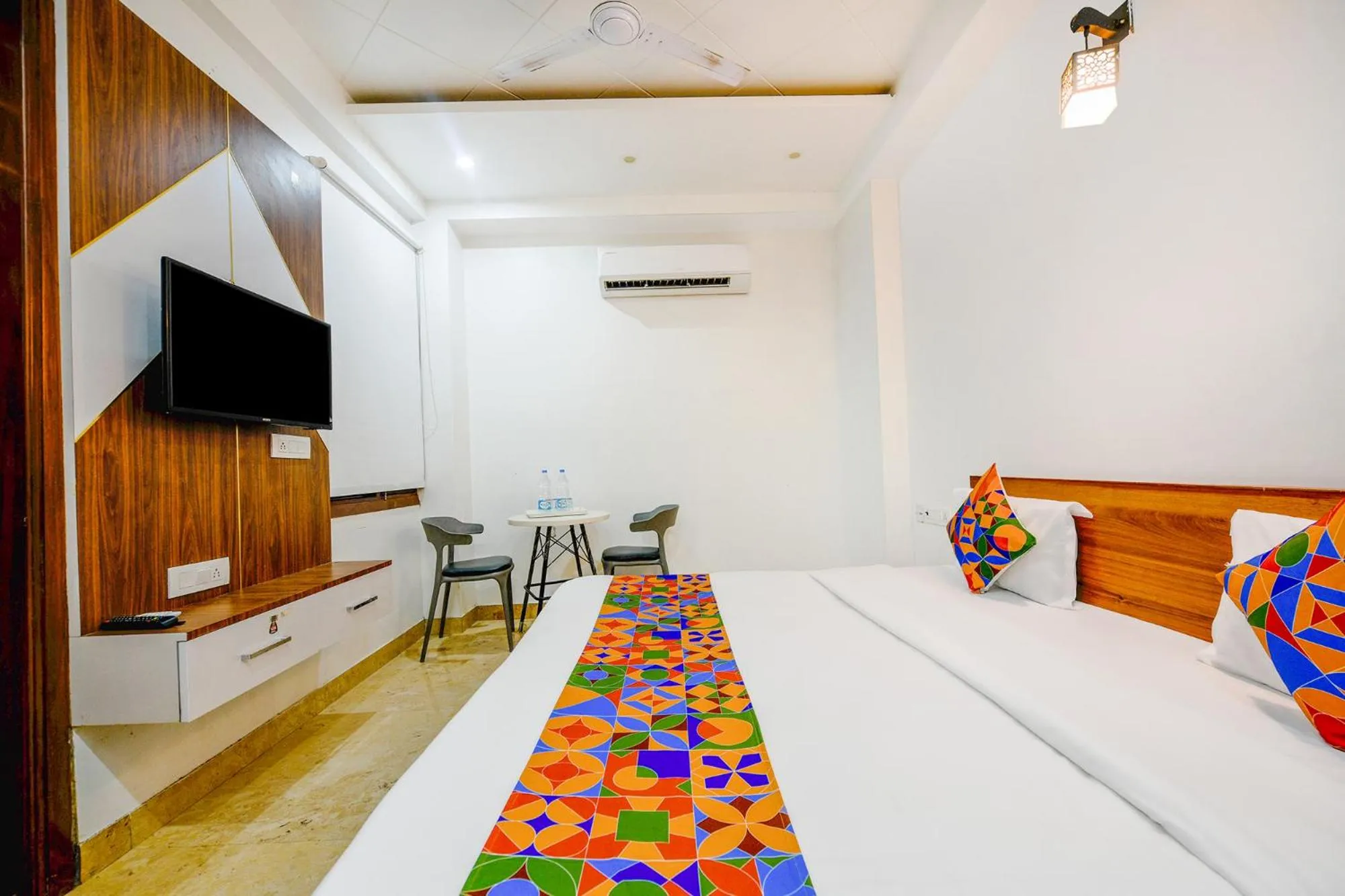 Bed in FabHotel Amrit Residency