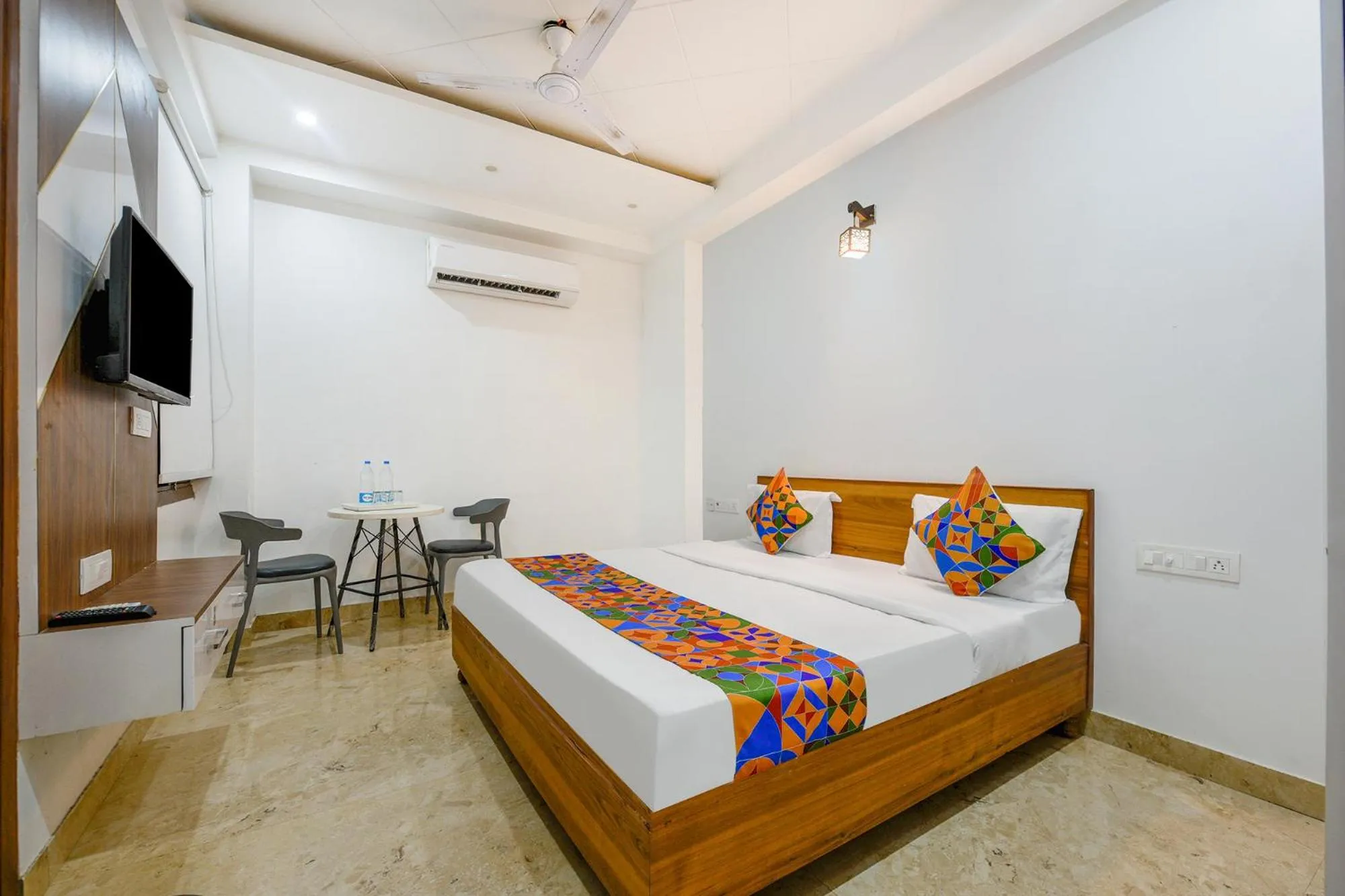 Bed in FabHotel Amrit Residency