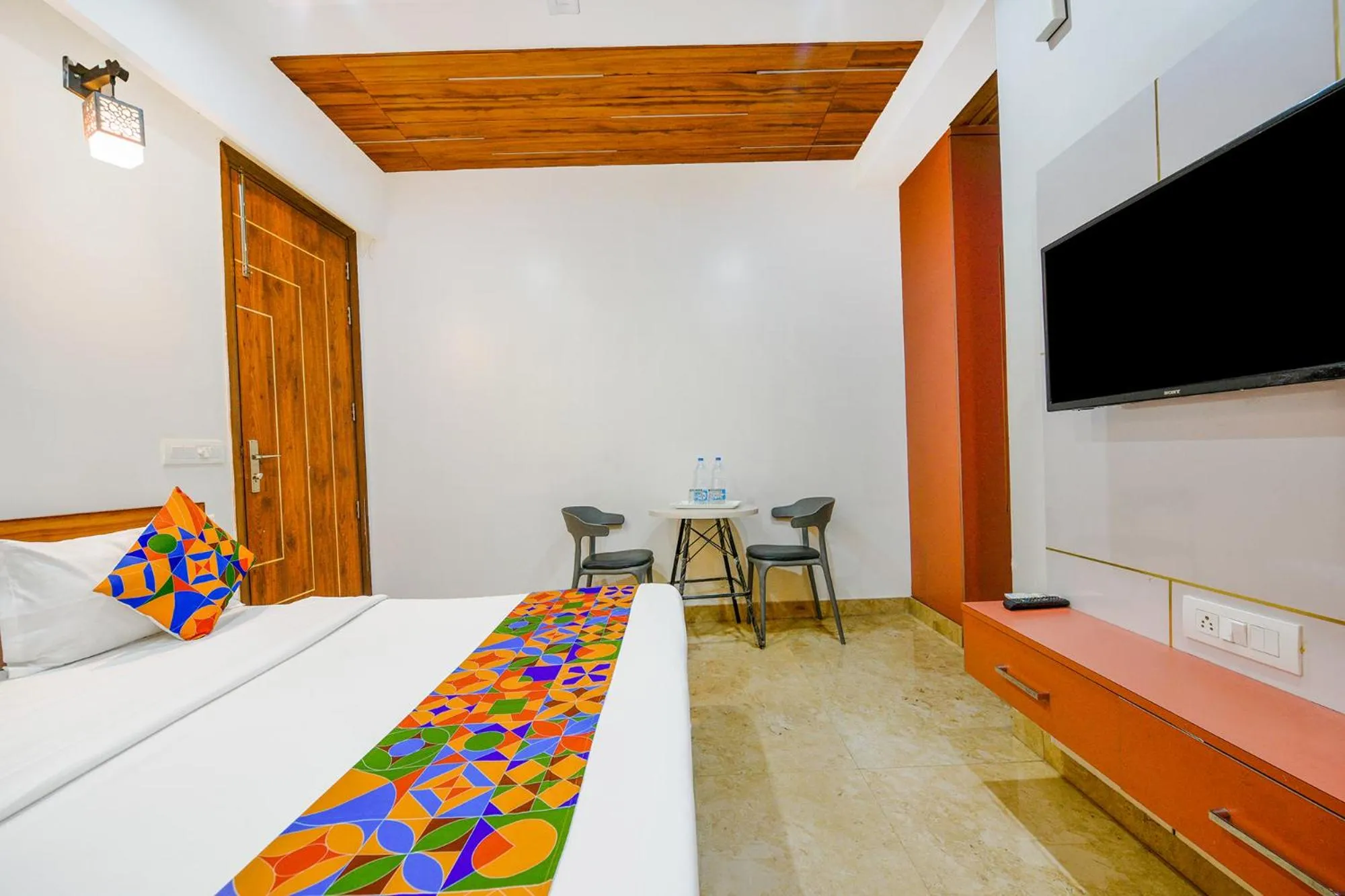 Bed in FabHotel Amrit Residency