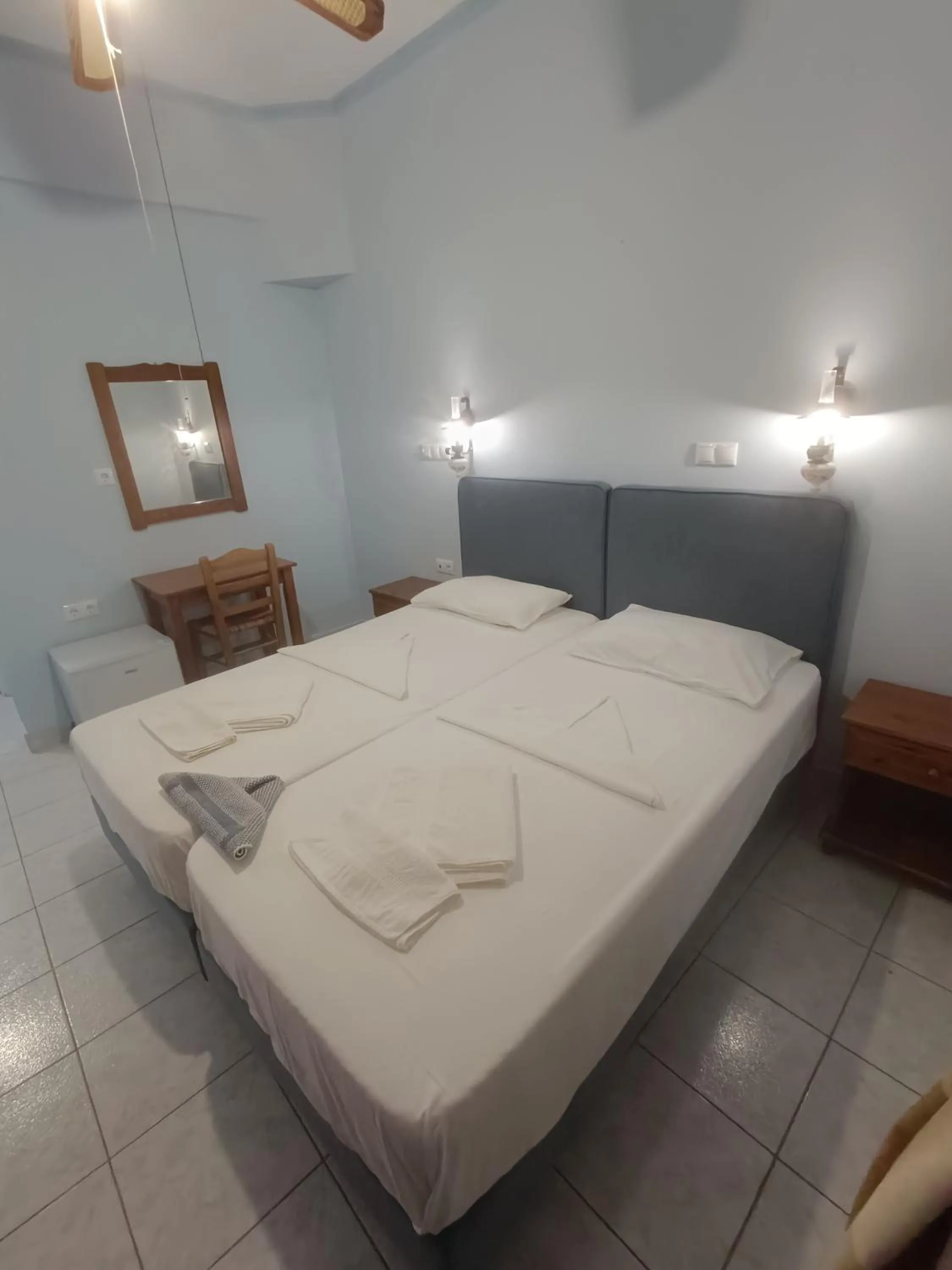 Bed in Hotel Asteria